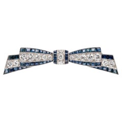 French Art Deco Platinum European Diamond & Sapphire Bow Pin Brooch