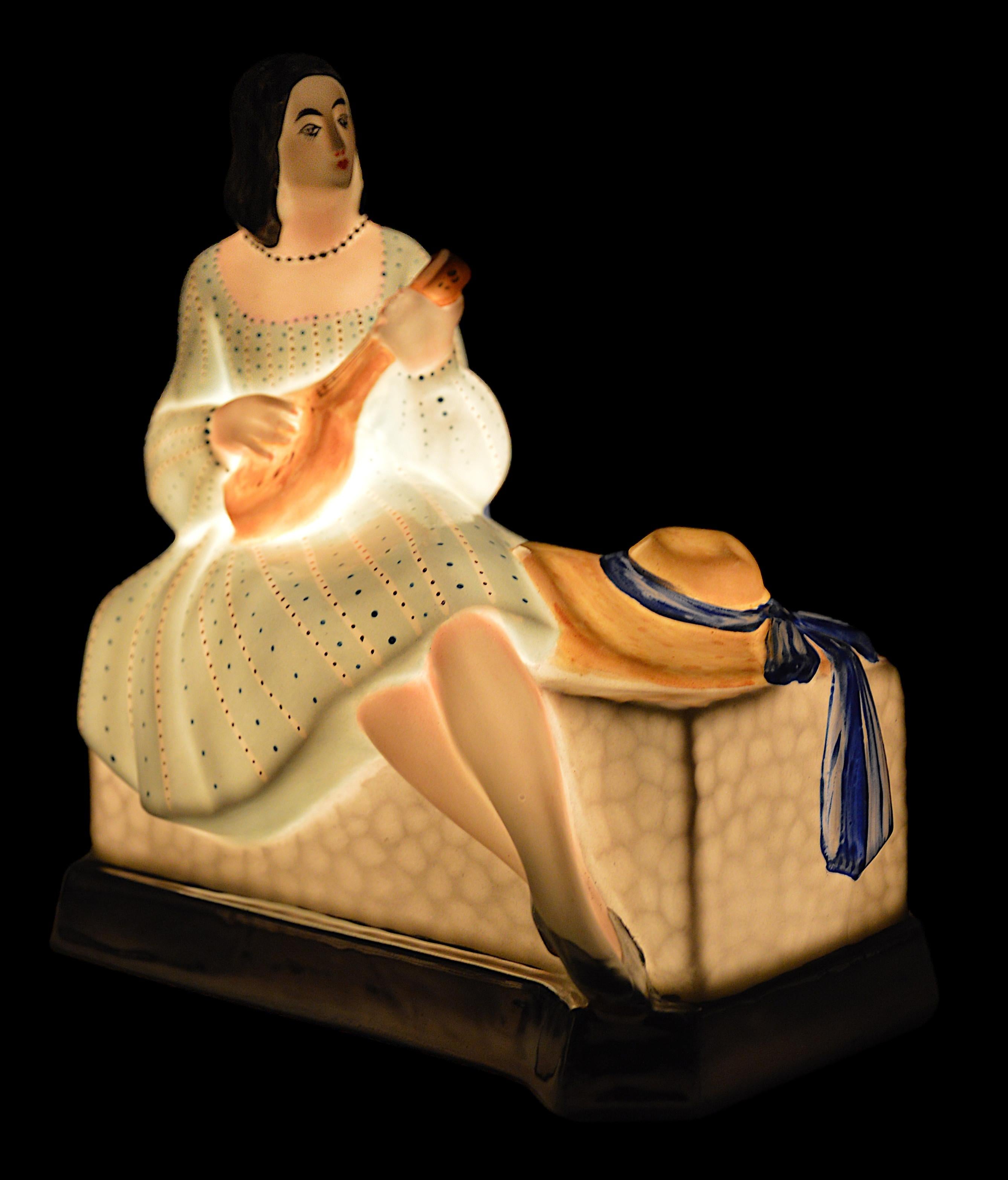 French Art Deco porcelain night-light, France, 1920s. Young woman playing the mandolin. Measures: Height : 6.7