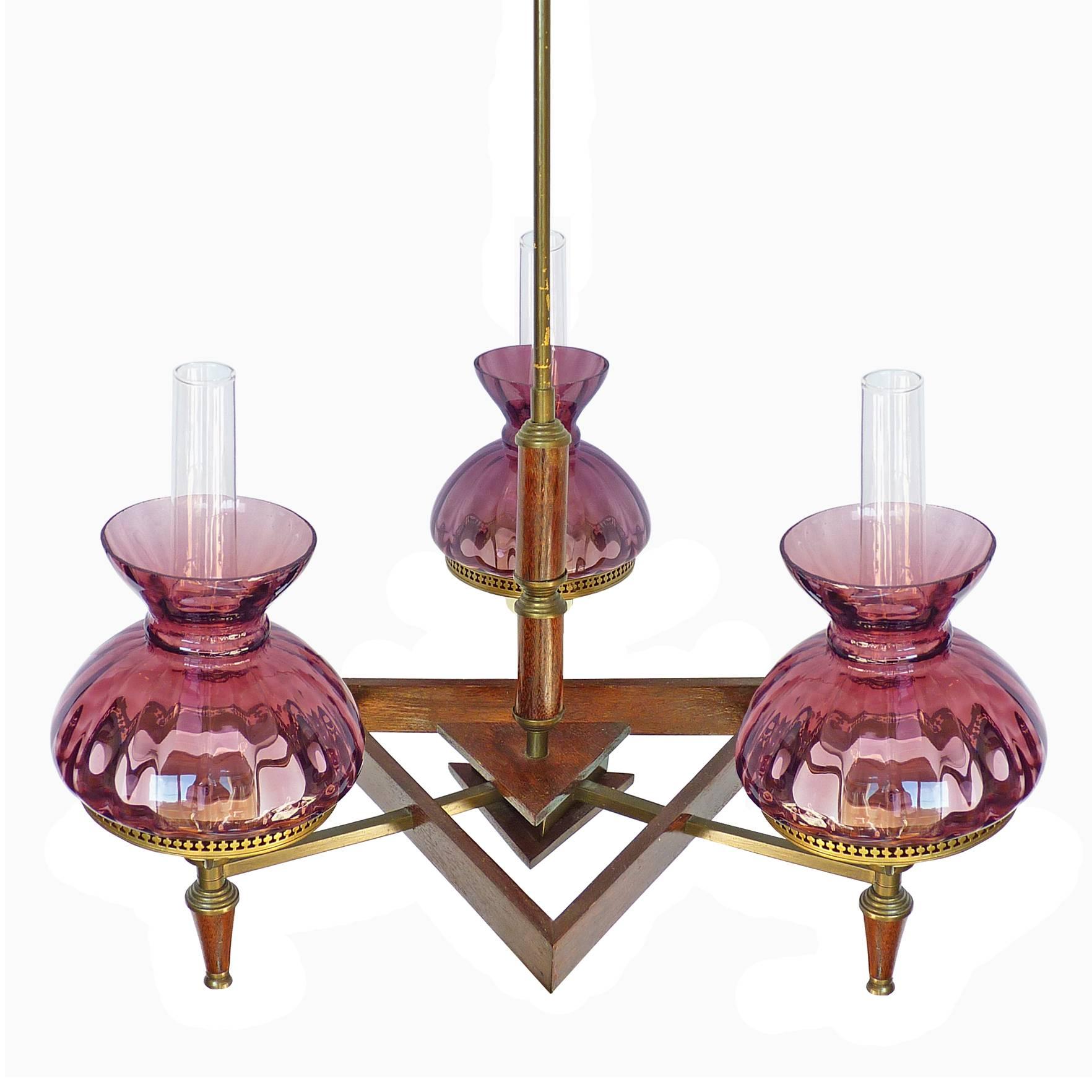 Antique French Art Deco purple amethyst glass shades / wood and brass / three-light chandelier.