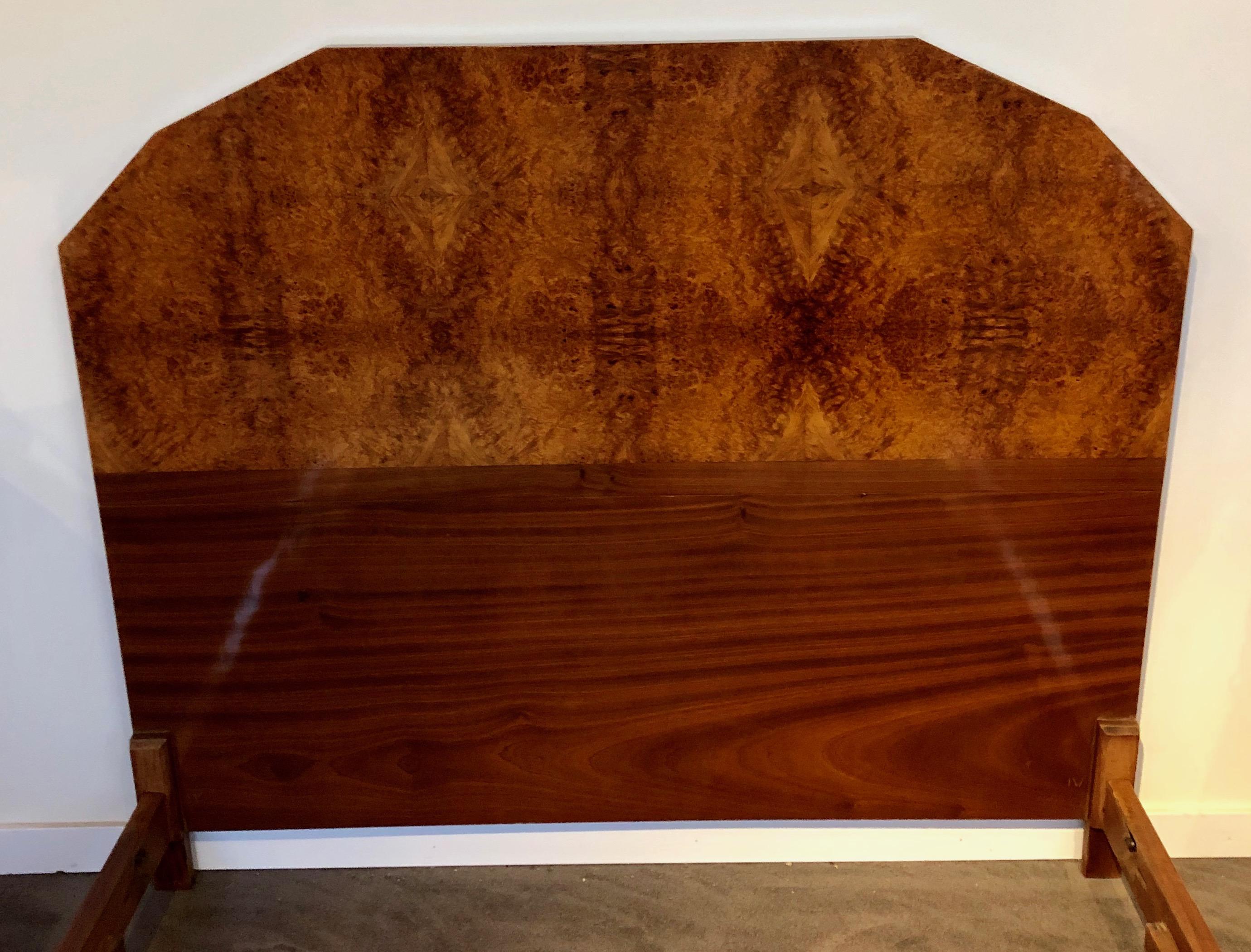 1930s French Art Deco bed frame. Spectacular exotic European bookmatched burl walnut. Converted to fit a standard queen size bed. Modernist design with stepped curved footboard and matching side rails.
The centerpiece for the beginning of any