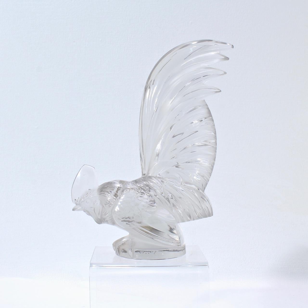 Coq Nain.

The iconic car mascot of a cockerel or rooster from the quintessential French Art Deco glass house - Lalique. The cockerel was first introduced in 1928 and is amongst the most popular of the car mascots ever produced. 

This model is