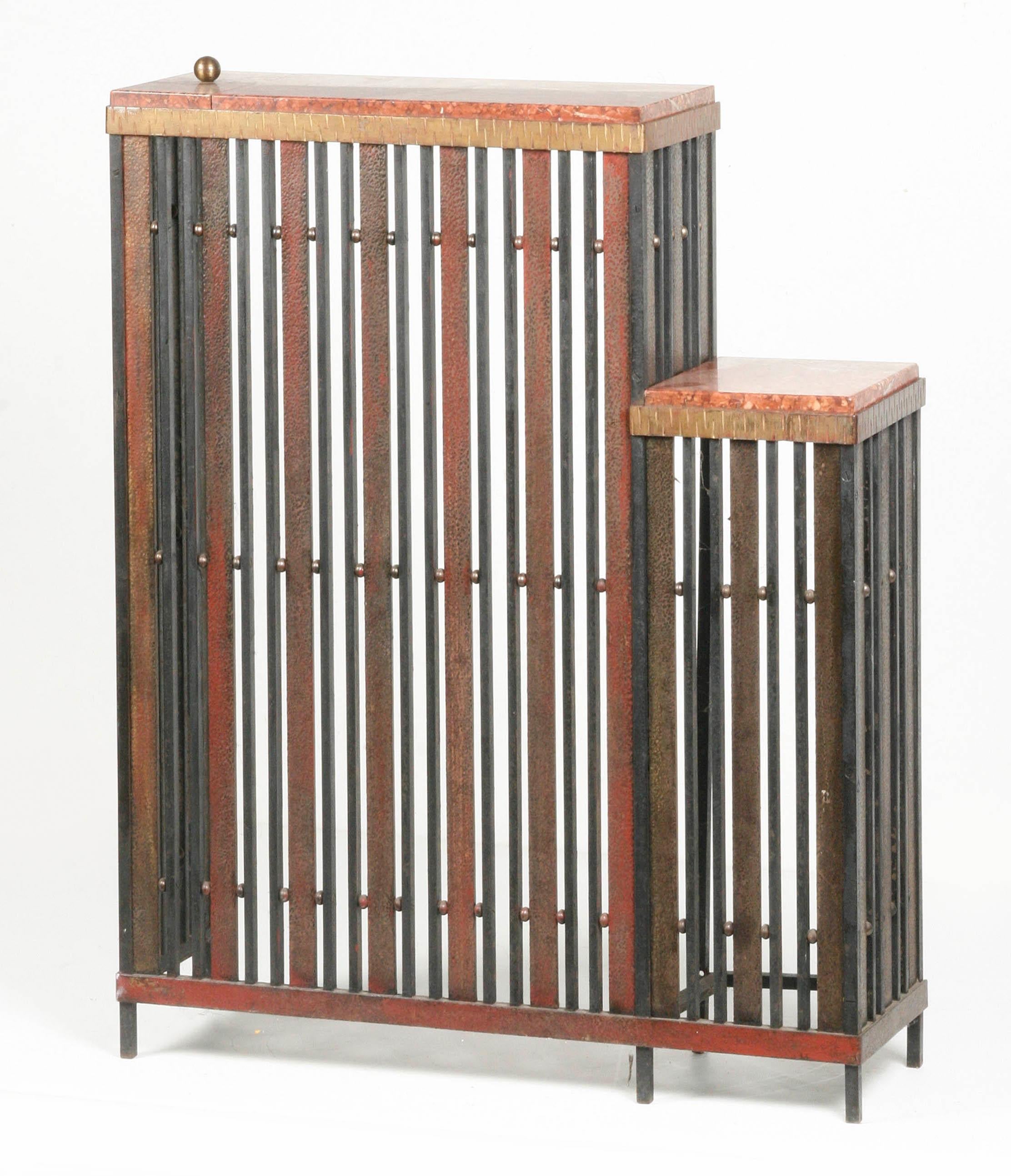French Art Deco Radiator conversion.
Made from wrought iron with marble top.
The iron is patinated in red. This piece of furniture can possibly be used as a side table. The type of marble is 