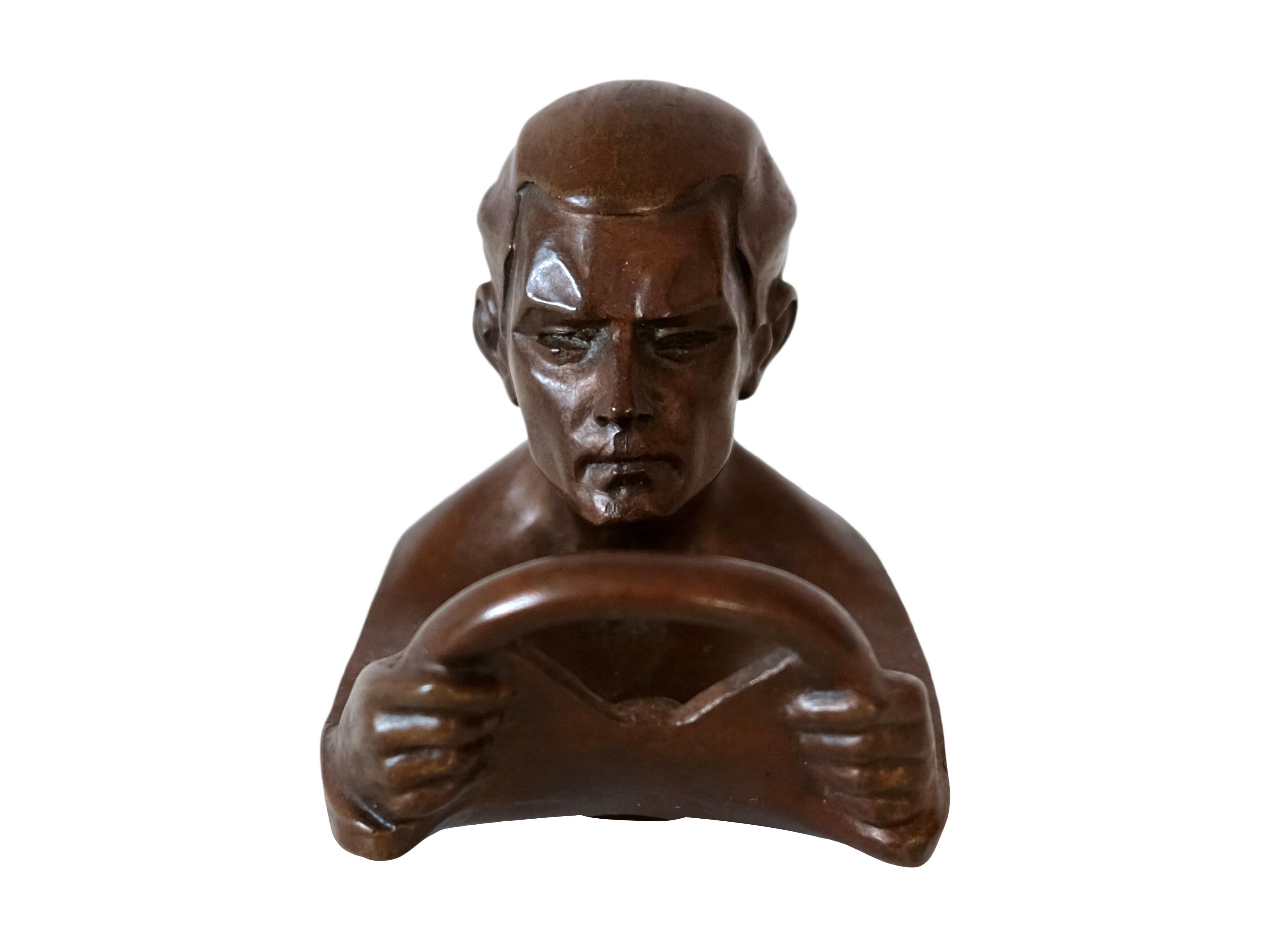 This Radiator Mascot is not only for collectors. 
The car driver is a decorative paperweight on your desk. 
Beautiful gift for car fans and passionated old-timer or sport-car drivers. 

Max Le Verrier, signed 
Vintage Sculpture in Bronze