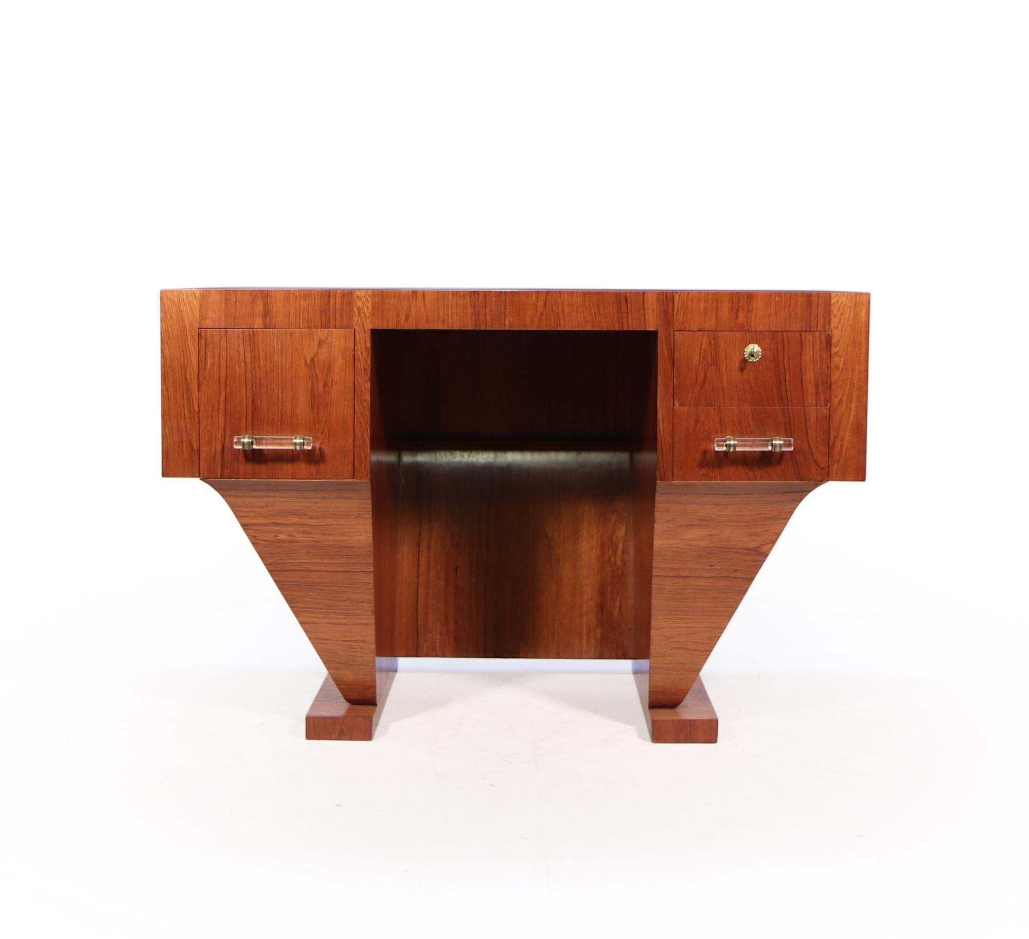 A very unusual desk of excellent quality produced in France in the 1920’s with an upside down pyramid shaped base and two drawers two the right top one is lockable and a single deep drawer to the left, this desk has been restored where necessary and