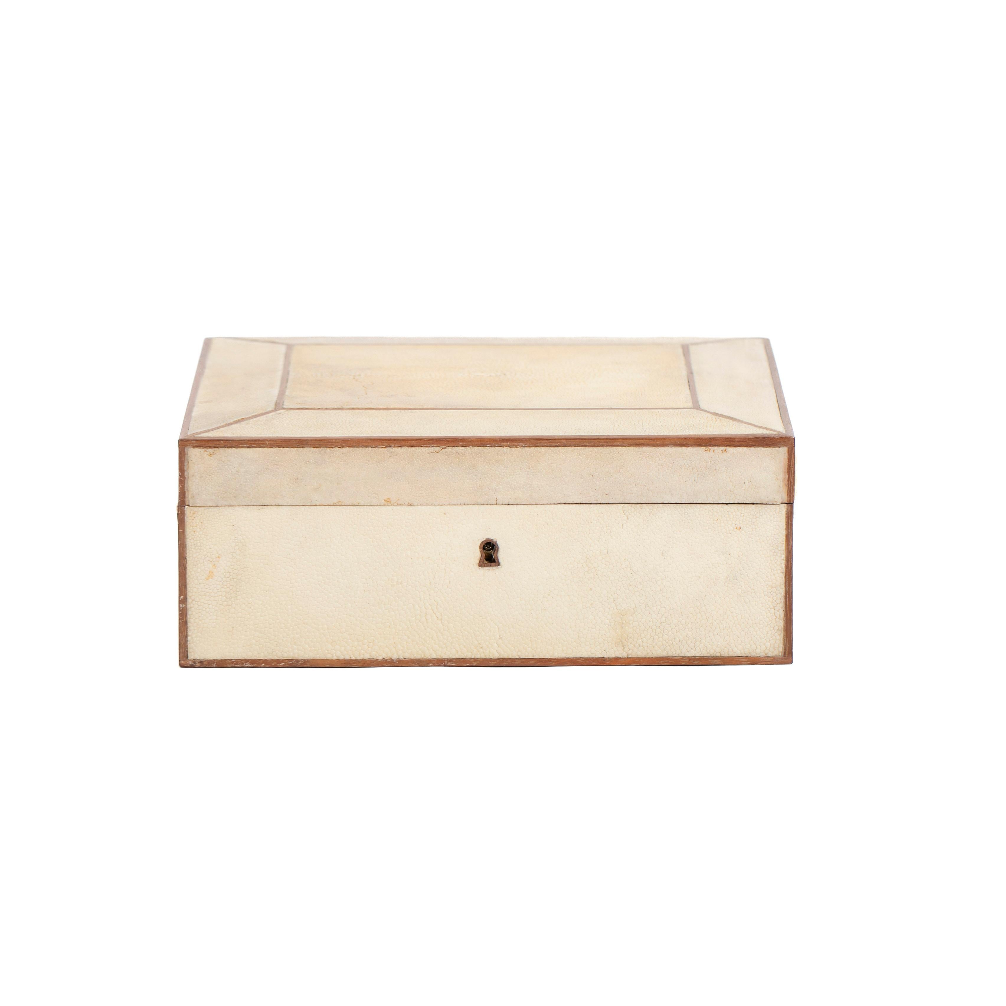 French Art Déco Rectangular Shagreen Leather Box for Cigars etc. from the 1930s. 
The interior is made of cedar wood, which particularly enhances the tobacco aroma.
There is a ribbed compartment in between.
The outside of the box is veneered with