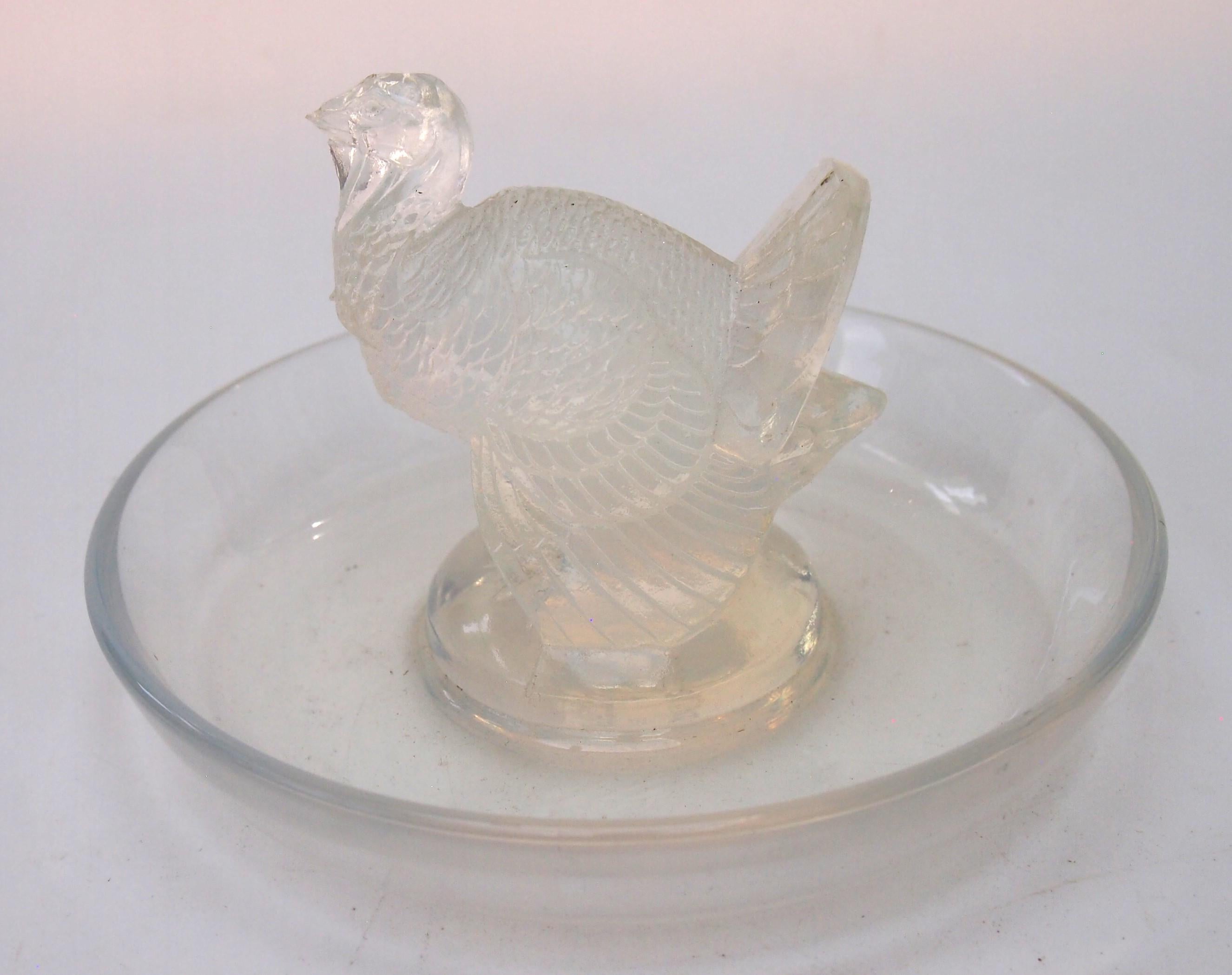 An very fine signed (R Lalique) Rene Lalique strong opal Dindon (Turkey) pintray -depicting a finely detailed Turkey, The piece has been photographed against white and black as opal always looks it's best against black - it dates from 1925