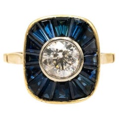 Anillo Art Déco francés con un diamante talla antigua de 1,00 ct y zafiros naturales