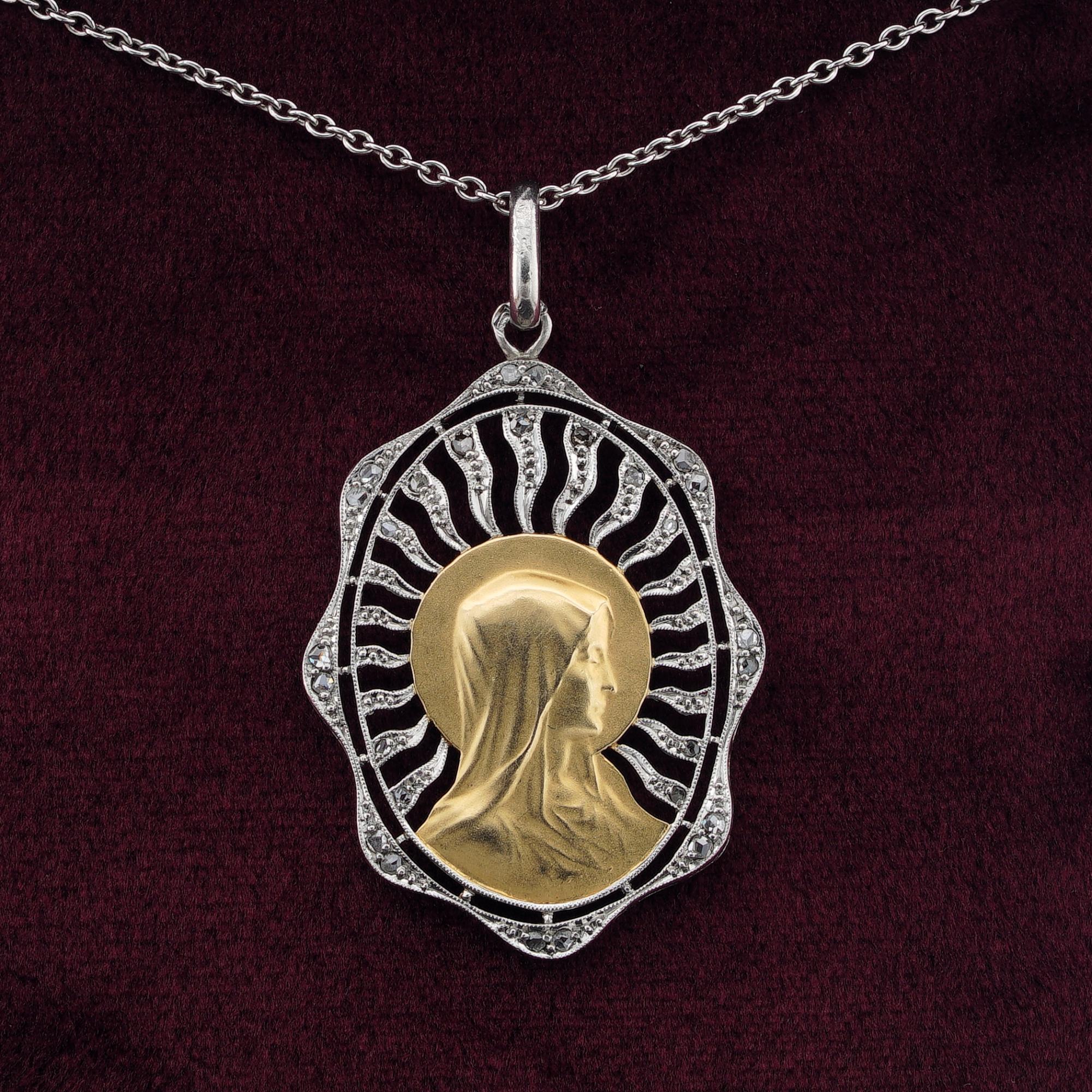 Holy Mother
This beautiful antique French pendant dates 1926 as precisely hand engraved, bearing French hallmarks
A fine Art Deco version of the Virgin Mary, beautiful depicted and rendered in a timeless artwork of solid 18 KT and Platinum
The