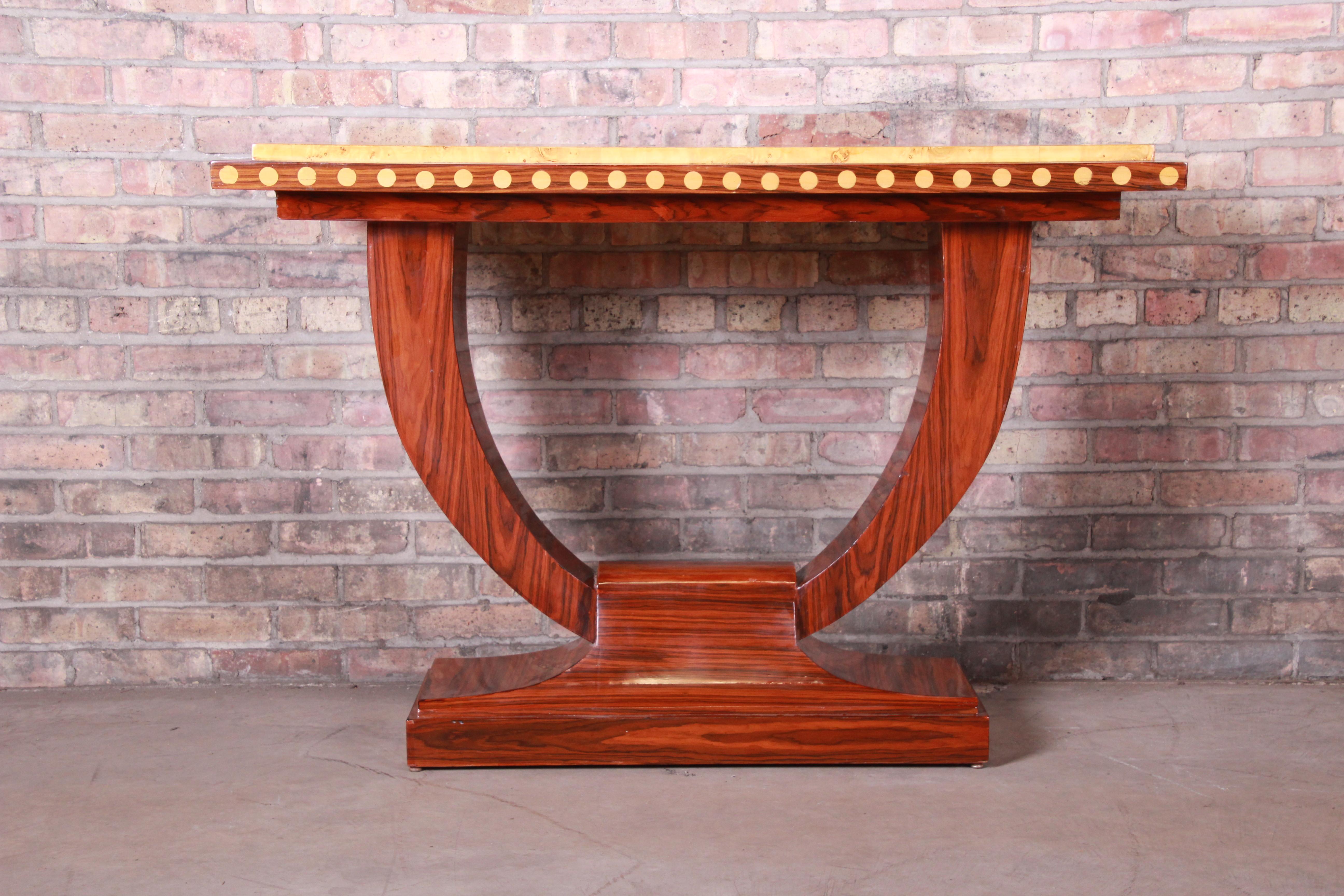 A gorgeous French Art Deco console, sofa table, or hall table

France, circa 1930s

Rosewood base, with olive ash burl top and accents.

Measures: 49.25