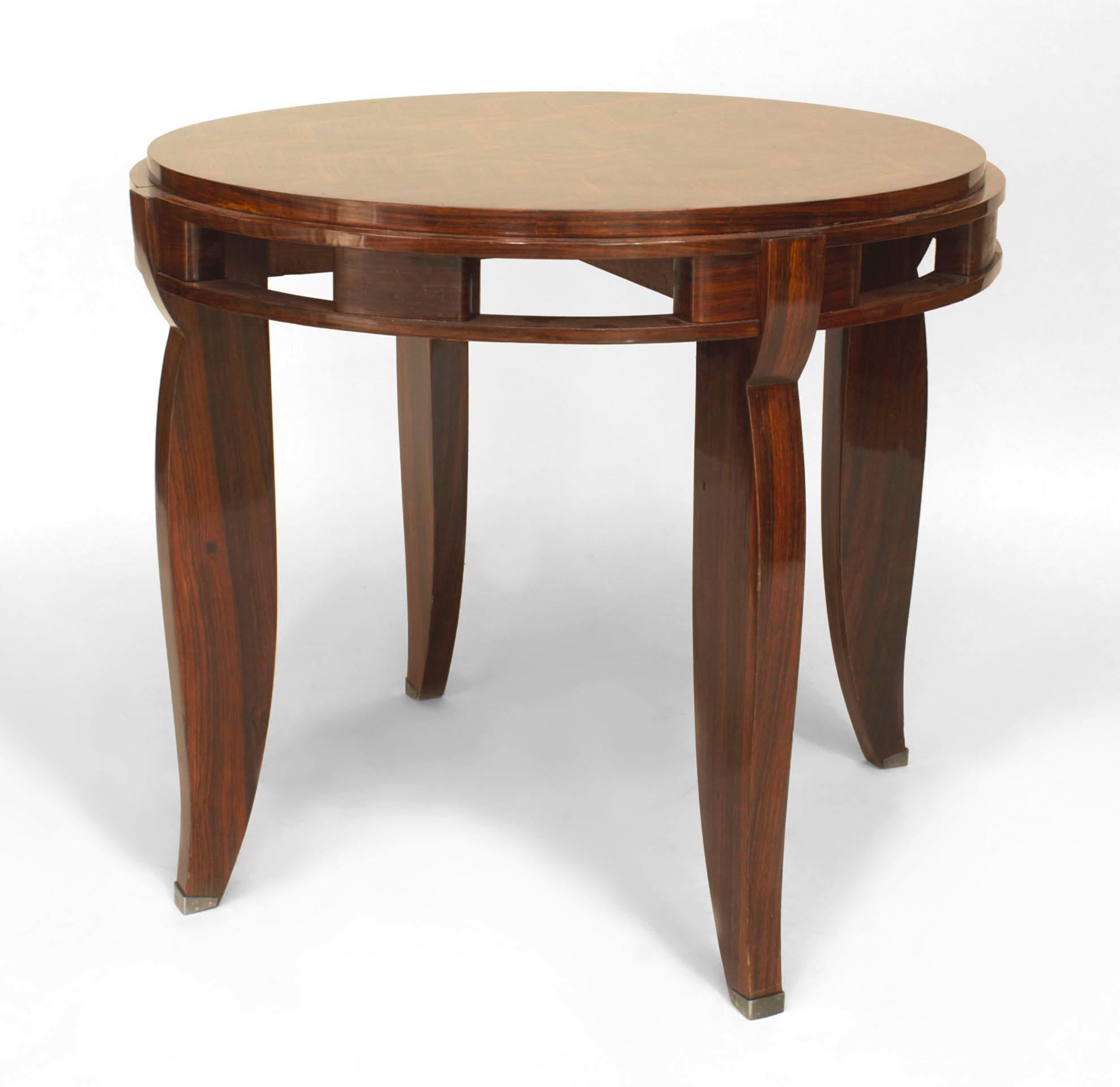 French Art Deco round rosewood end table with a geometric diamond design top & open apron with silver sabot feet. (Attributed to JULES LELEU)
