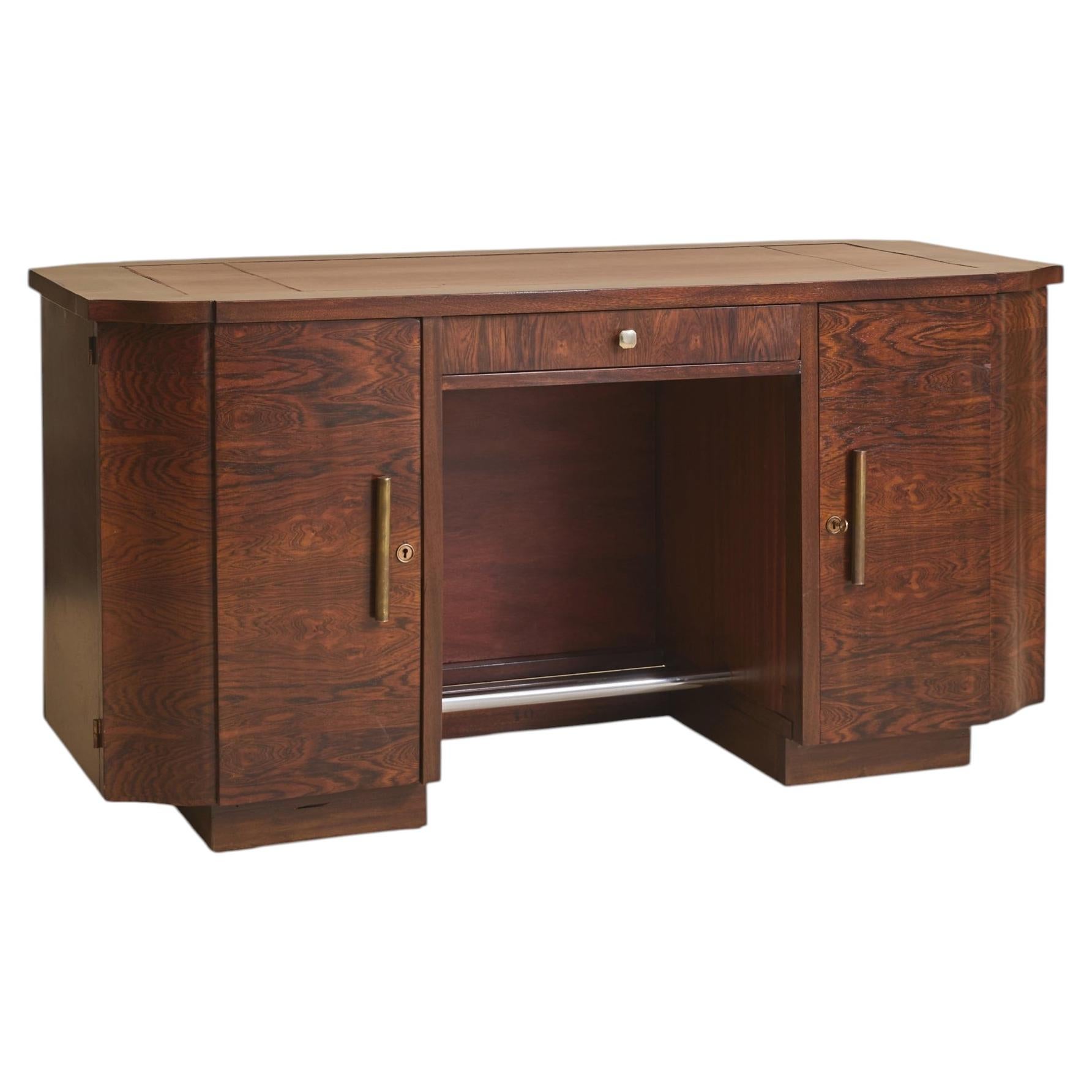 Bureau Art déco français en bois de palissandre et cuir, par Jules Leleu, années 1940