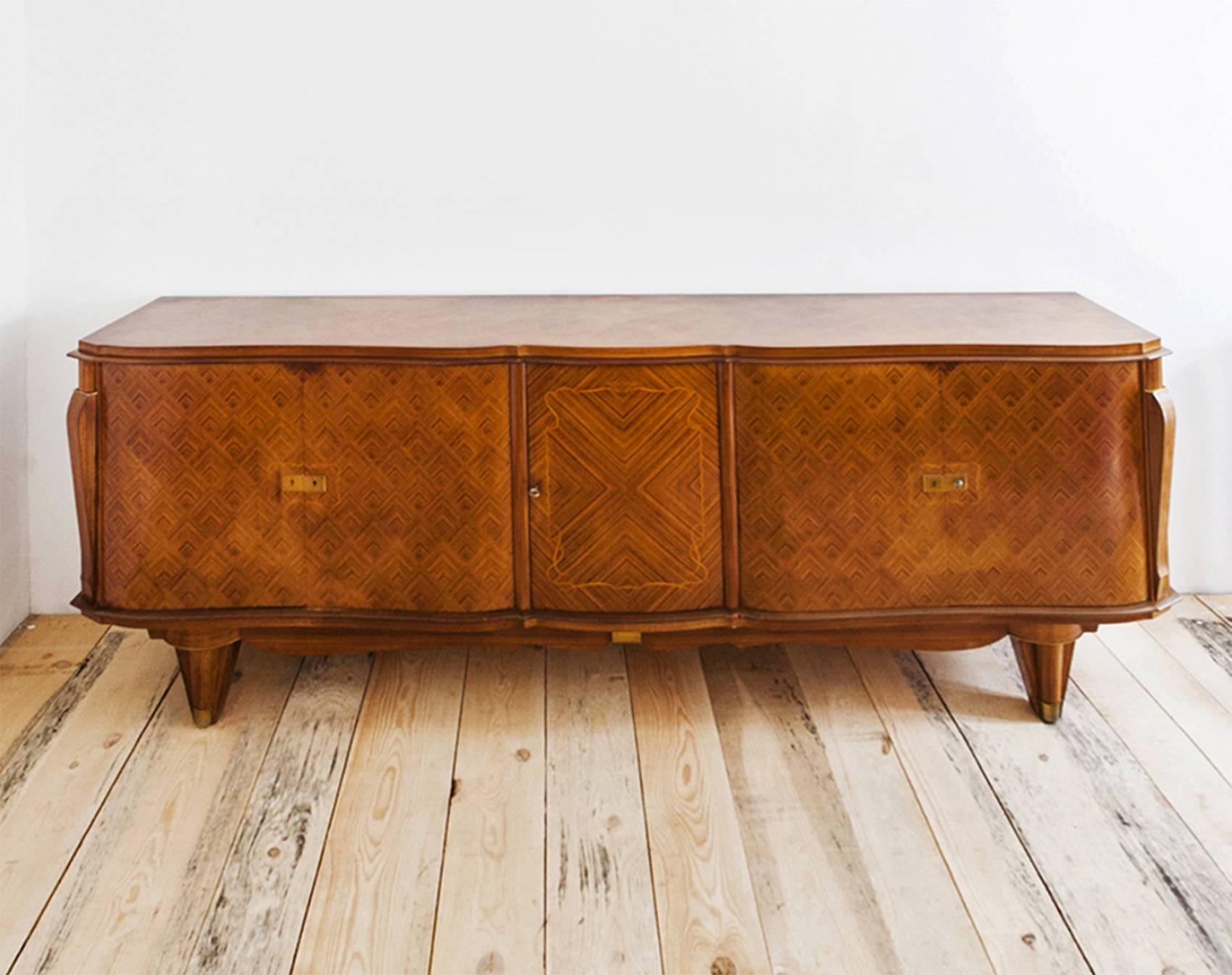 Very high quality French Art Deco sideboard attributed to one of the most prominent French Art Deco designers Jules Leleu. Produced in the 1940s in marquetry technique in diamond pattern. In good condition, never been restored, really minor traces