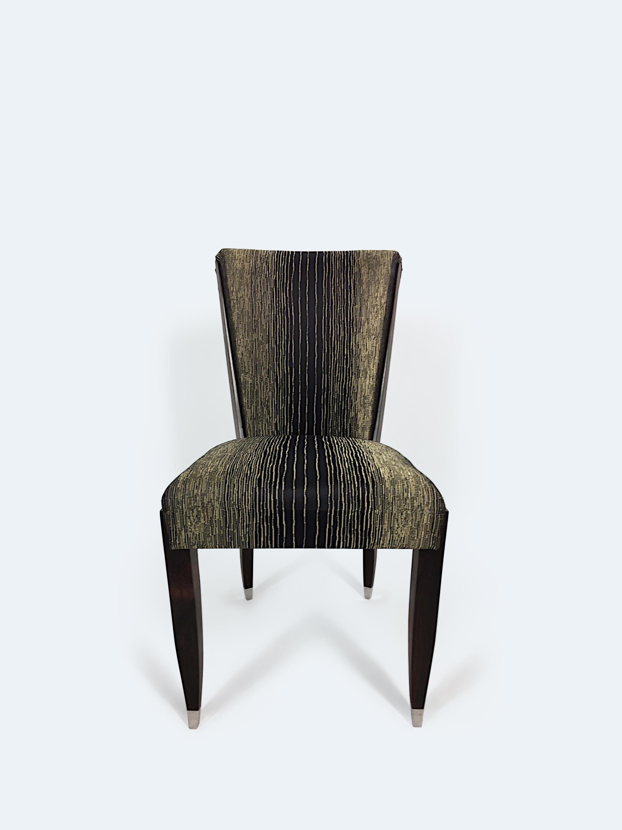 Presenting a stunning set of six chairs that perfectly capture the elegance and craftsmanship of the Art Deco era. This exquisite ensemble features graceful curves and balanced proportions, showcasing the finest traditions of French design. Crafted