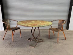 French Art Deco Round Iron Garden Table with Abstract Base