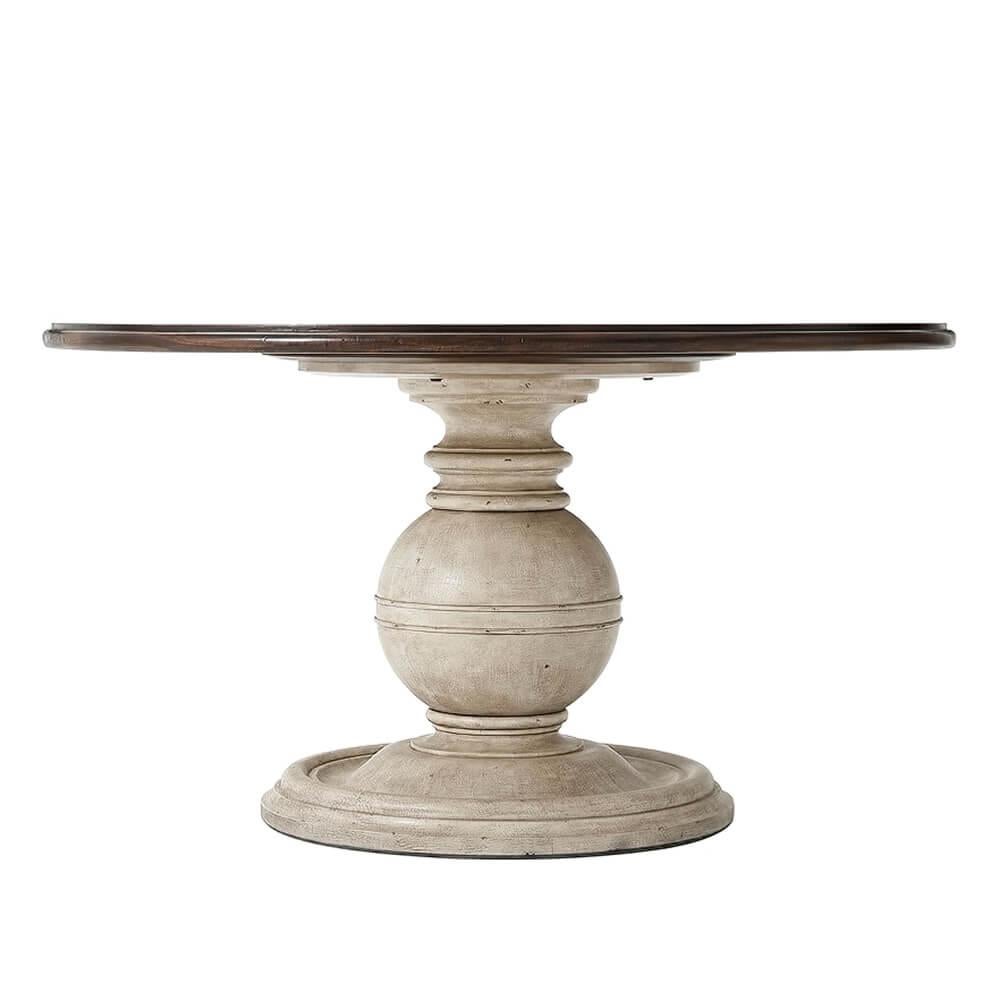 A mahogany and cerejeira dining table, the circular crossbanded and molded edge top above a vintage white painted sphere and collar column with a turned and dished base. Inspired by a 1930s French Art Deco original.

Dimensions: 54