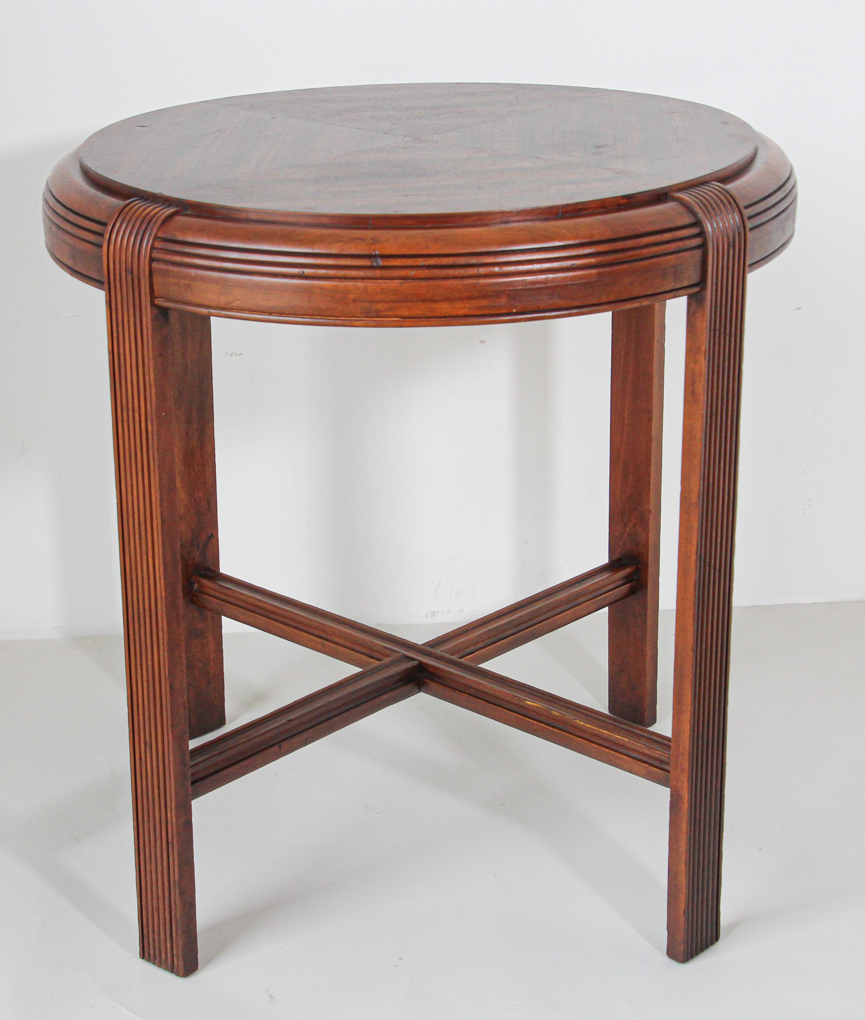 French Art Deco round side table in Jacque Adnet style.
France, circa 1930s.