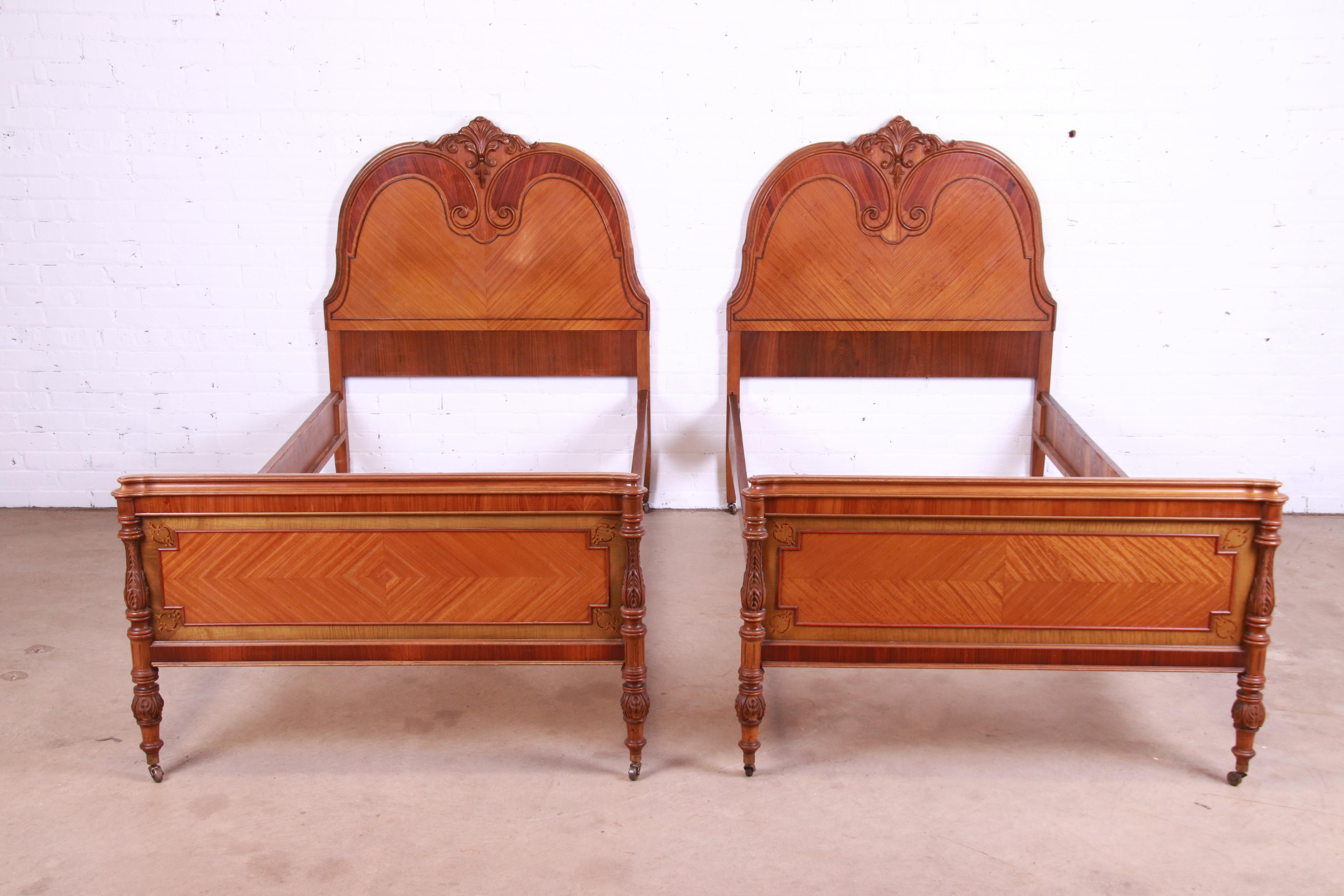 Early 20th Century French Art Deco Satinwood and Carved Walnut Twin Beds, Circa 1920s
