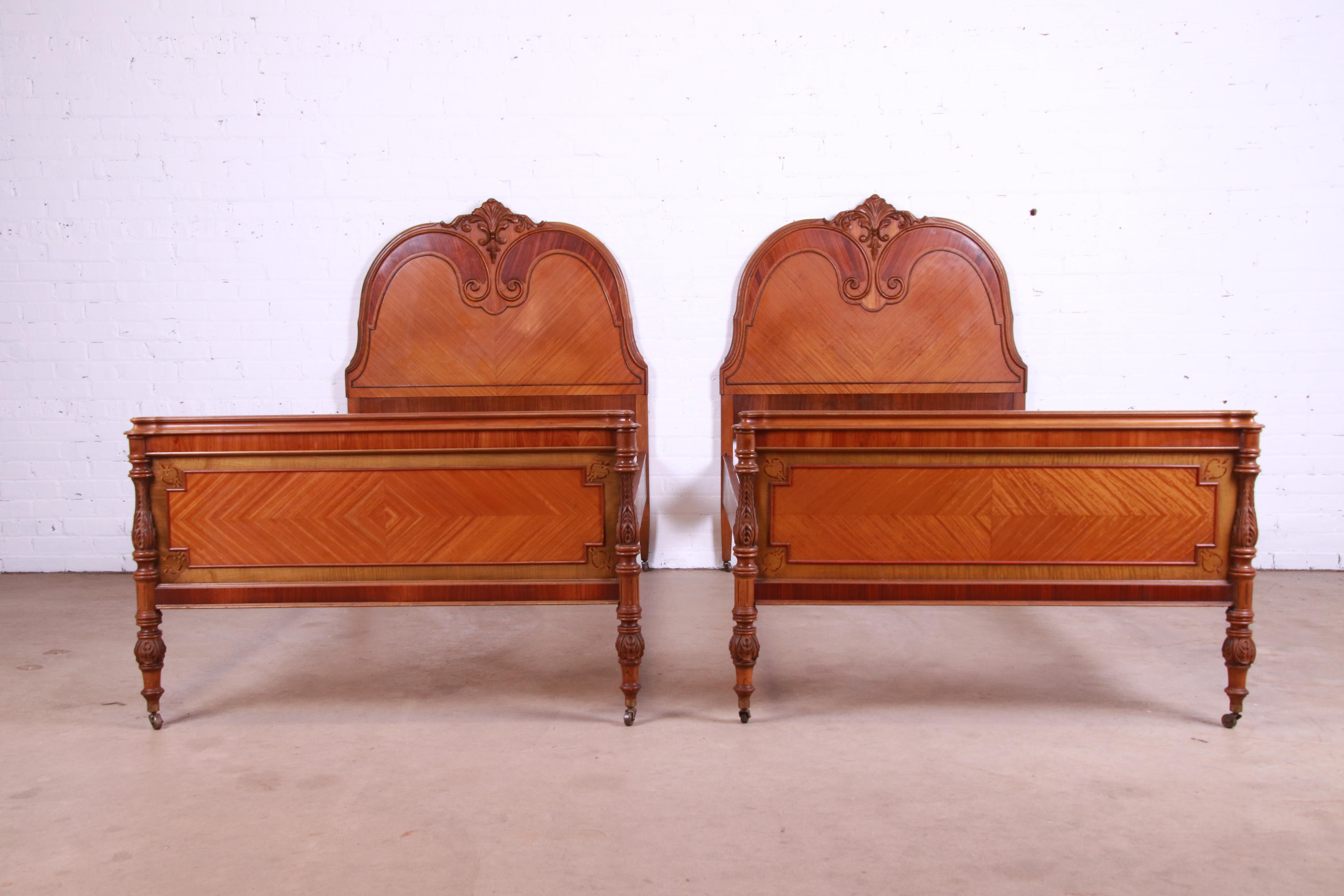 French Art Deco Satinwood and Carved Walnut Twin Beds, Circa 1920s 1