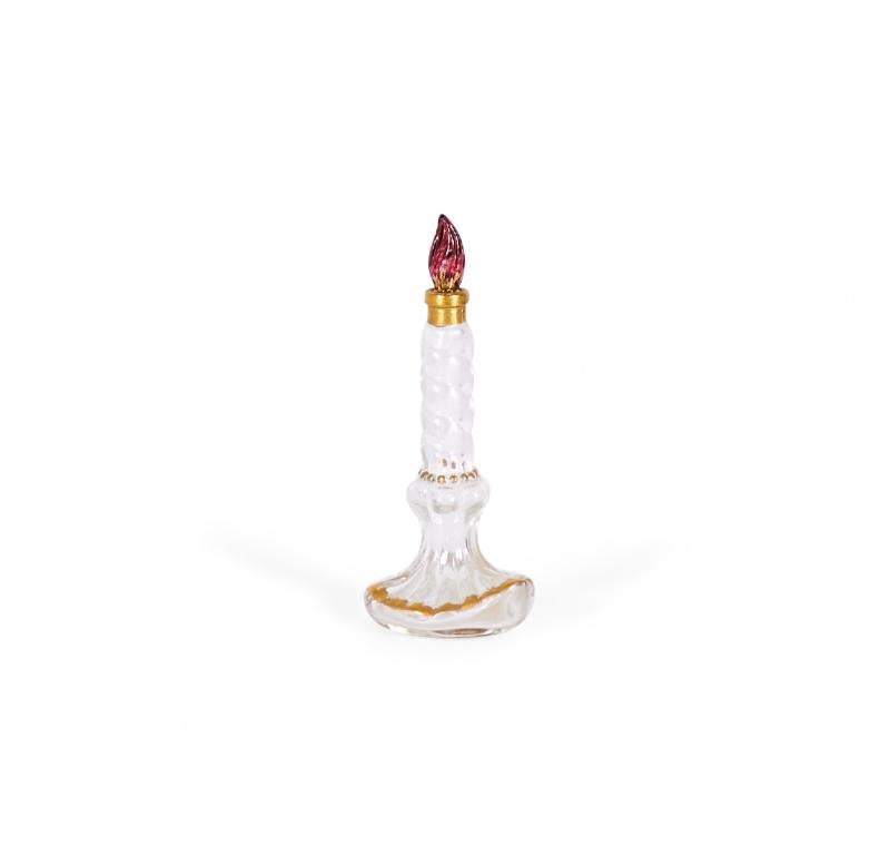 French Art Deco clear glass perfume bottle (SLEEPING by ELSA SCHIAPARELLI) shaped like a candle in a candle holder with gilded trims and a red-tinted glass stopper shaped like a candle flame (BACCARAT)
