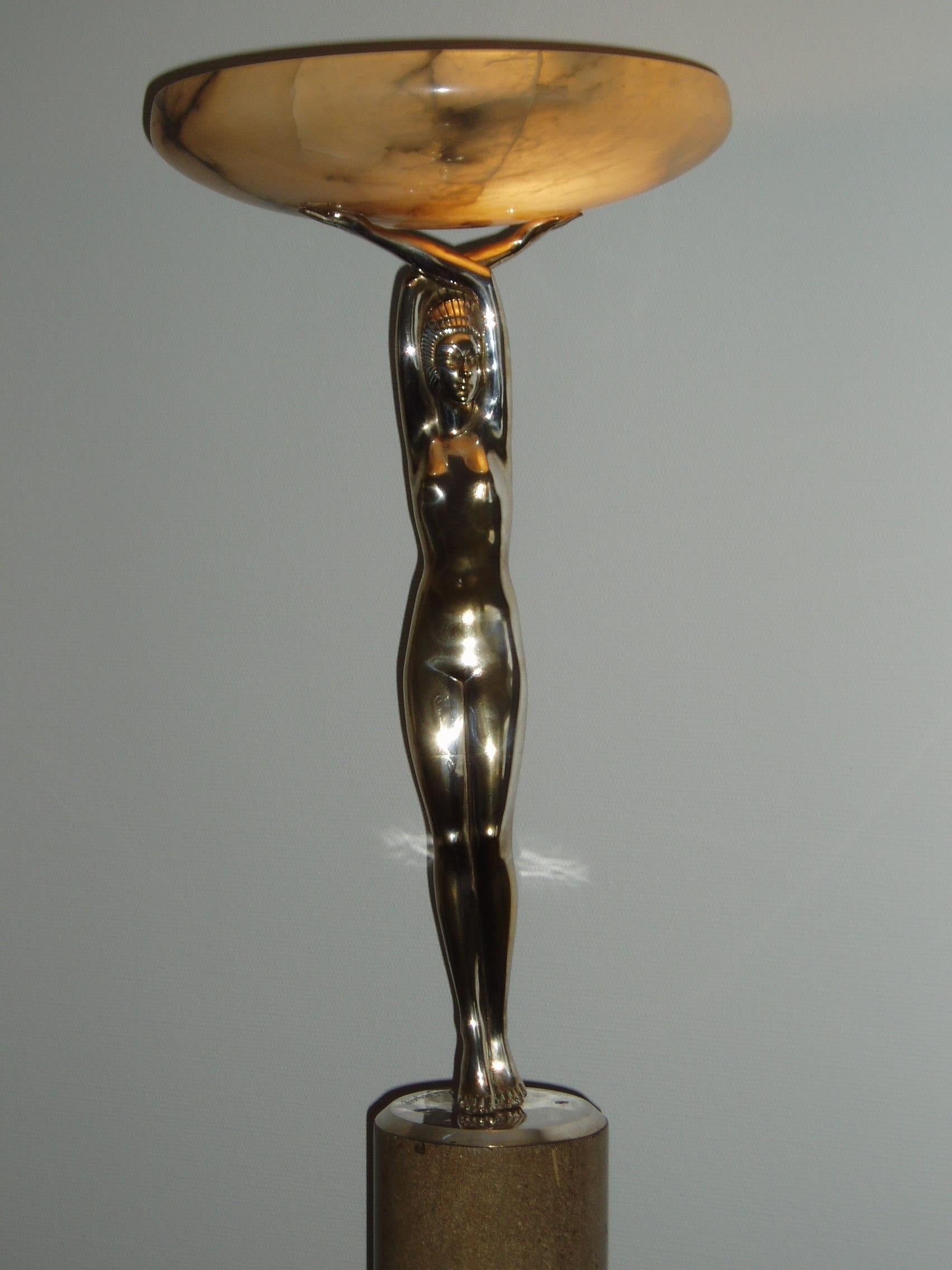 Bronze French Art Déco Sculpture by Pierre le Faguays on high Stone Base. Illuminated. For Sale