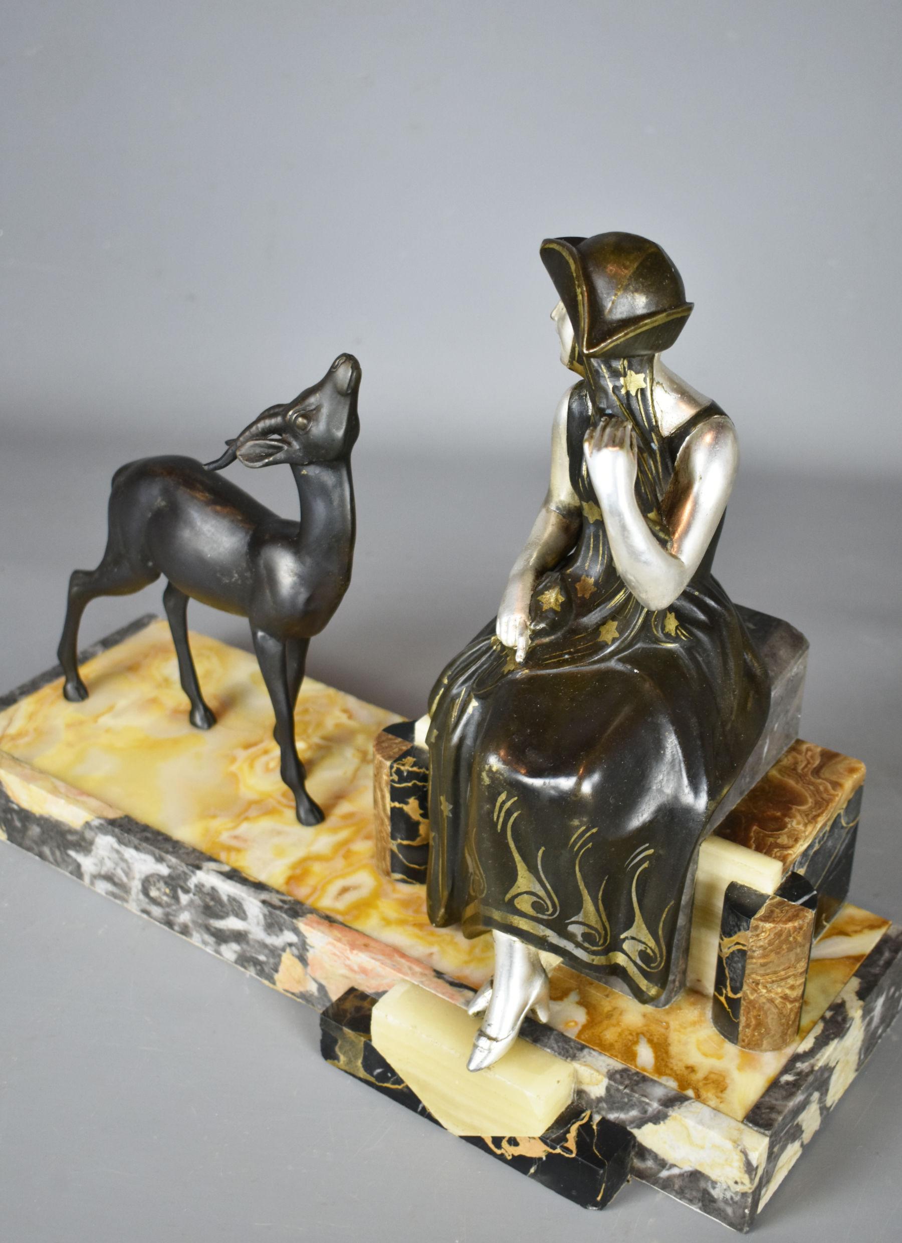 Français Sculpture française Art déco d'une dame et d'une gazelle en vente
