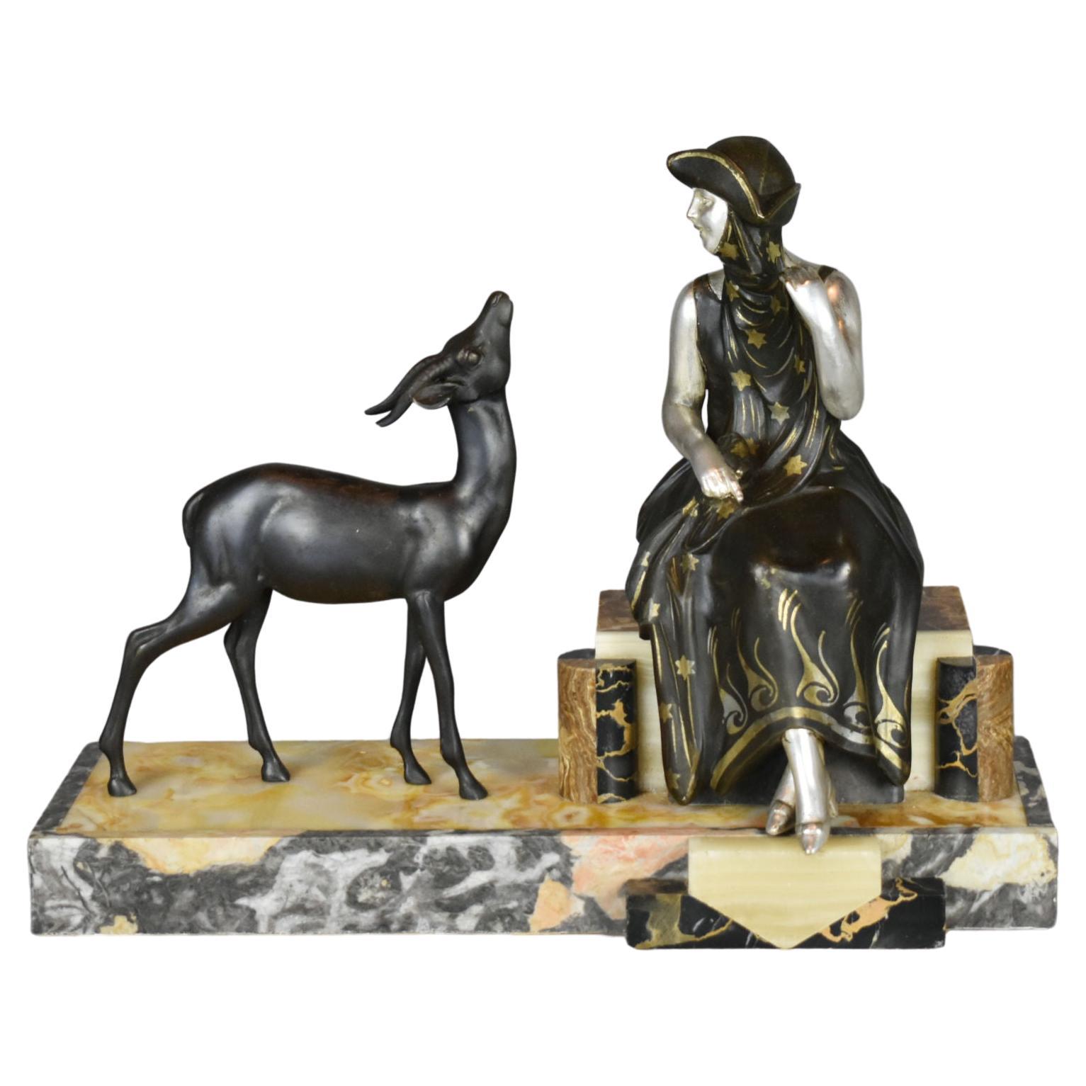 Sculpture française Art déco d'une dame et d'une gazelle