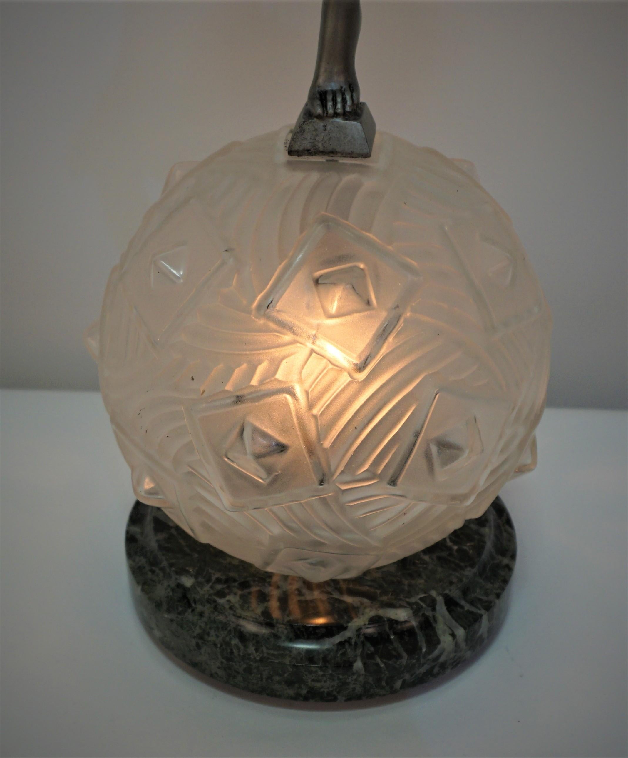 French 1920's Art Deco lamp, sculptural tambourine dancer over clear Frost geometric glass lampshade.