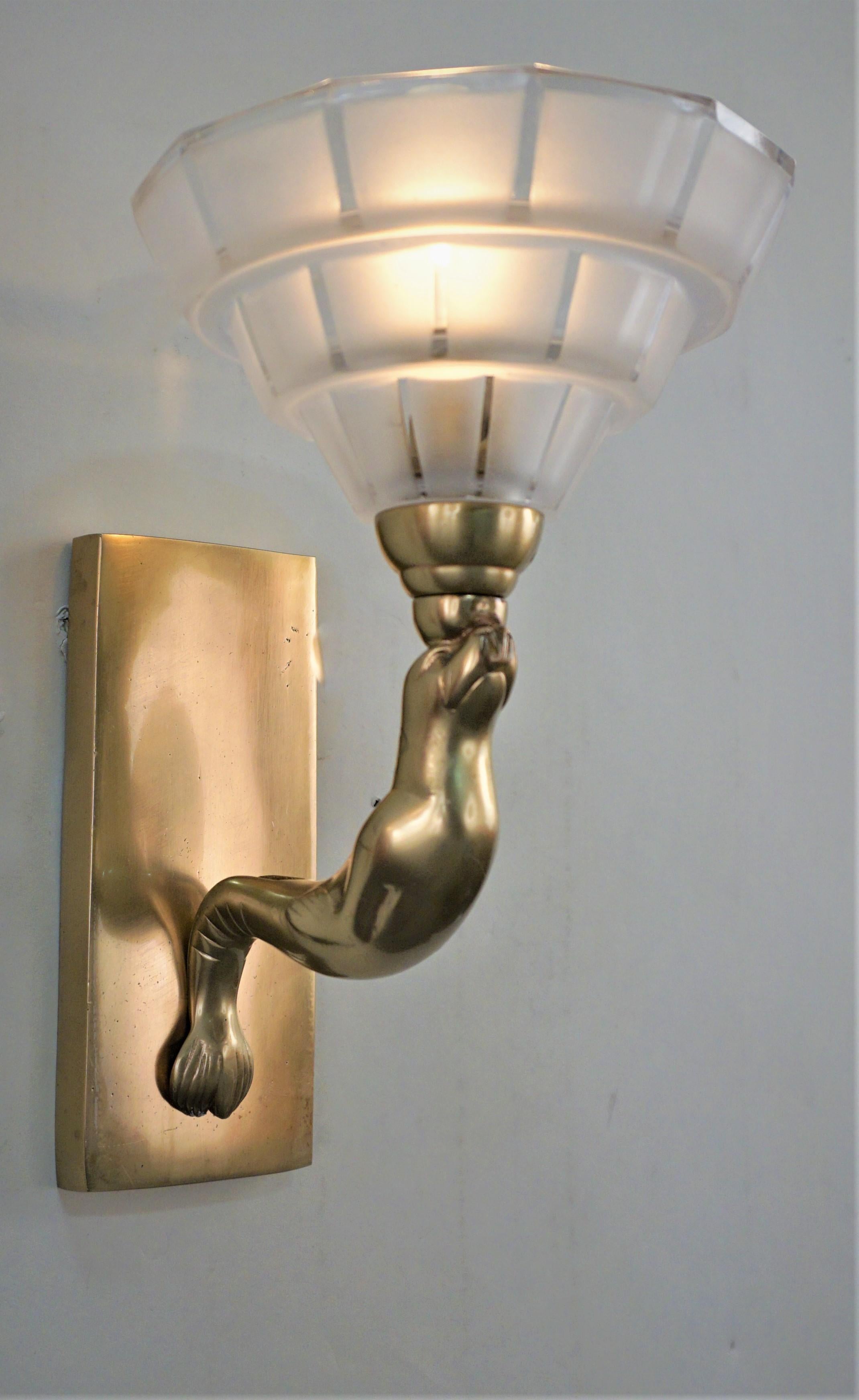 Elegant 1920's bronze seal with clear frost glass shade wall sconces
Professionally rewired and ready for installation.
Back plate measurement