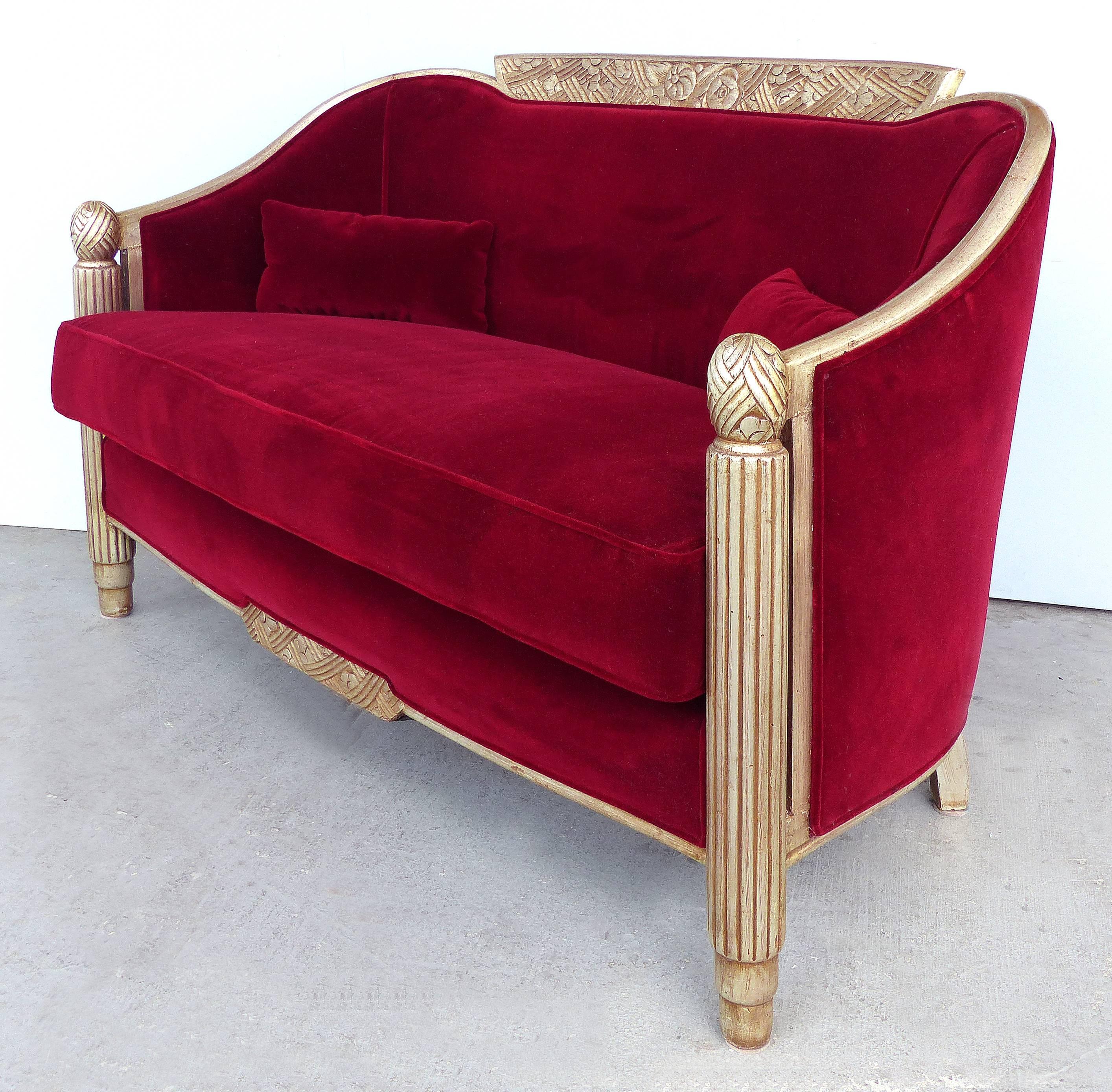 Paul Follot French Art Deco Settee and Bergères Set

Offered for sale are a French giltwood Art Deco settee and pair of bergeres by Paul Follot (1877-1941). The set has been upholstered in a deep burgundy mohair velvet fabric which remains in Fine