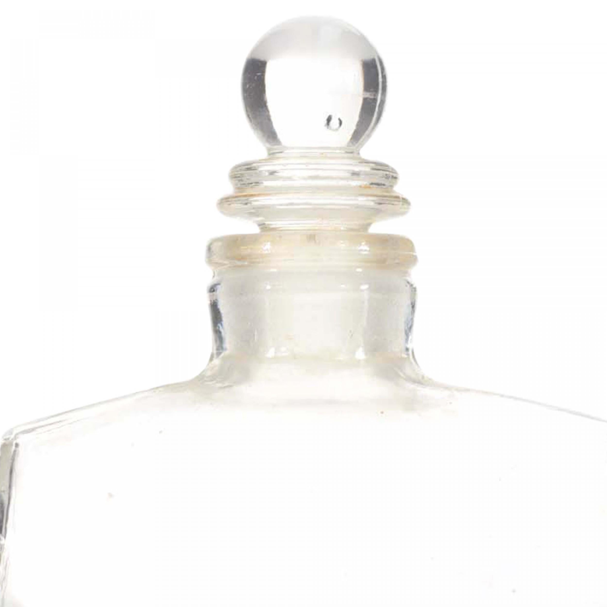 Bottiglia di profumo in vetro trasparente francese Art Deco rettangolare (SHOCKING di Schiaparelli) a forma di busto femminile di manichino da sarta, con tappo in vetro a forma di palla.