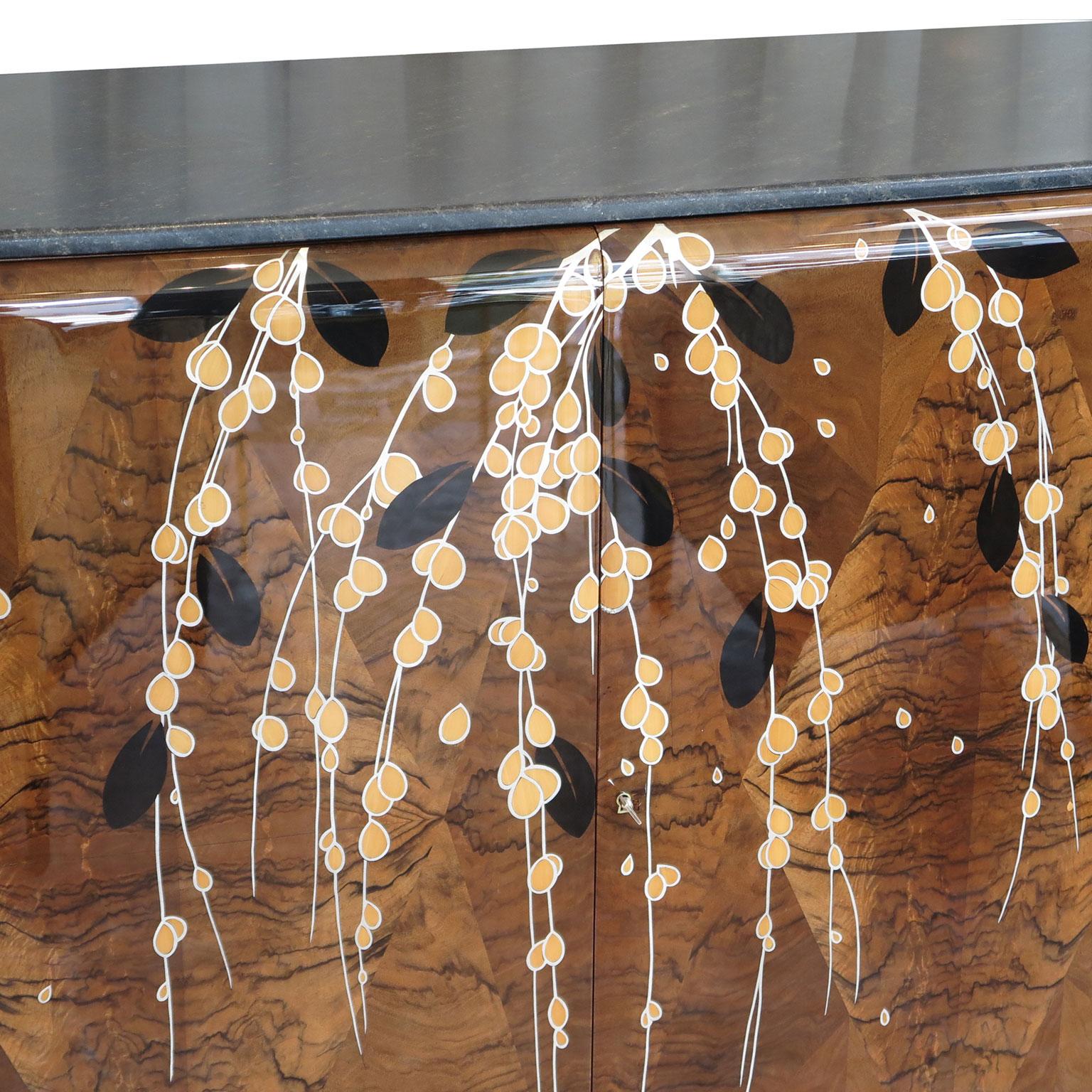 French Art Deco sideboard with diamond patterned parquetry in European walnut burl by Michel Dufet (1888-1985). Cascading marquetry floral vines done in exotic woods with painted details, decorate the front of buffet. The marquetry design depicts