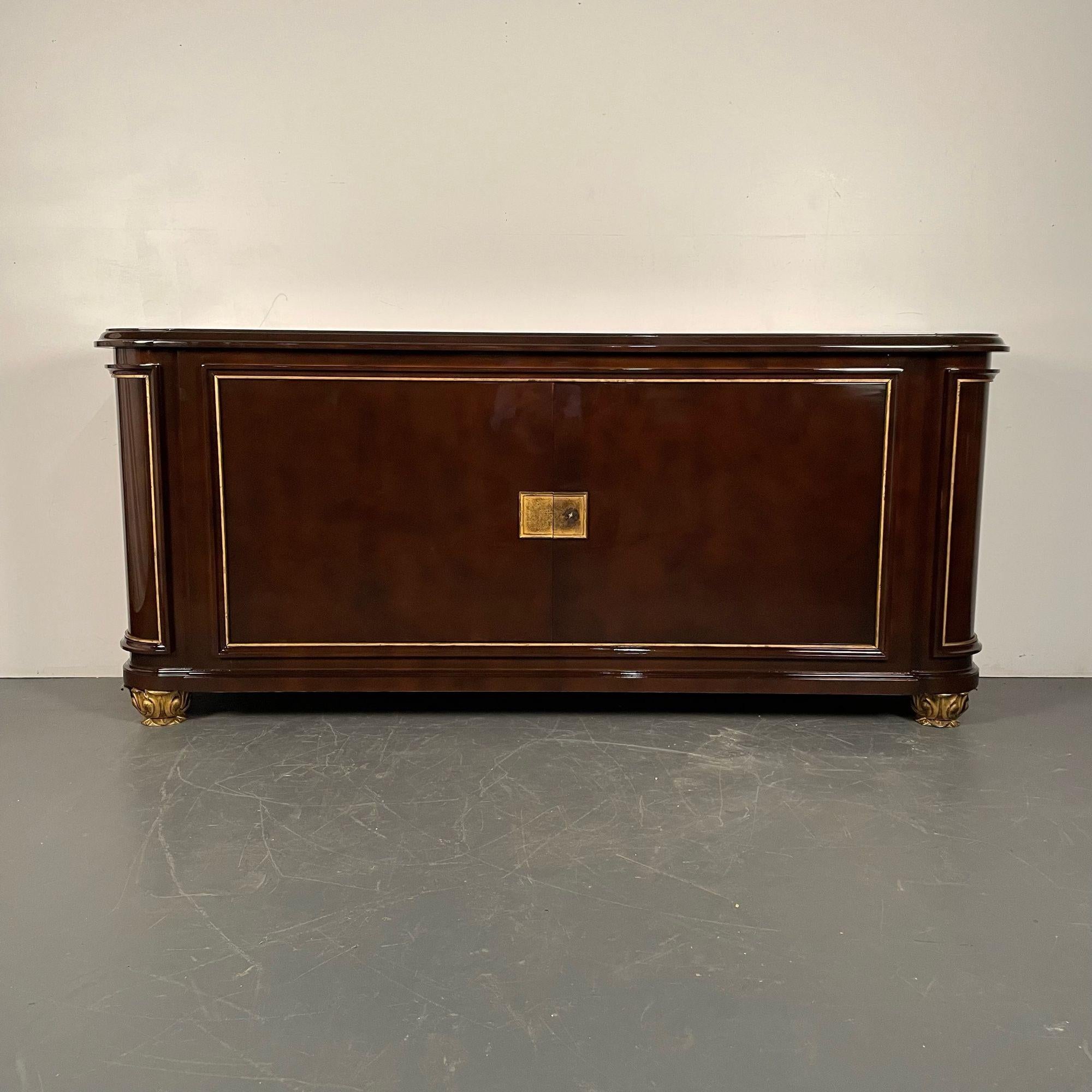 Rene Drouet, French Art Deco, Sideboard, Brown Lacquer, Gilt Wood, France, 1940s

Important mid-century brown lacquer and gilt two-door cabinet or sideboard. Two large doors leading to a fitted finished interior having inlays and interior drawers