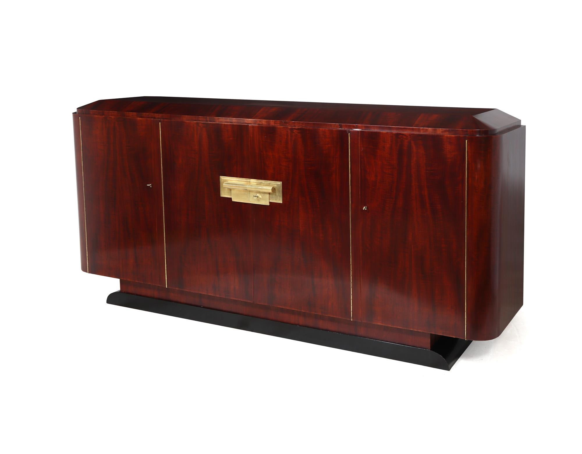 FRENCH ART DECO SIDEBOARD
An exceptional French Art Deco sideboard attributed to André Domin & Marcel Genevrière for Maison Dominique, having four locking doors and adjustable shelves behind two drawers behind the centre doors, two large heavy cast