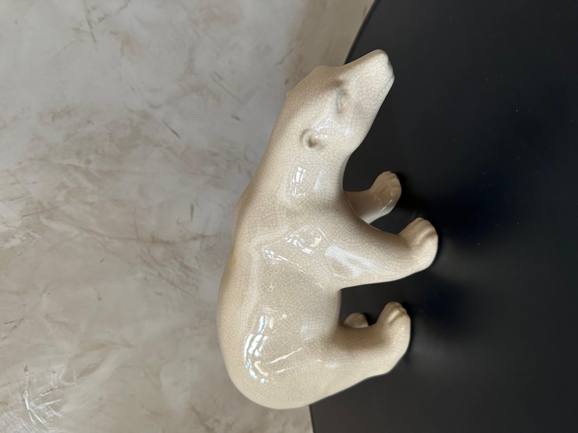 Beautiful polar bear in cracked and glazed art deco ceramic with L&V CERAM signature under the belly.
Very good condition and good quality.