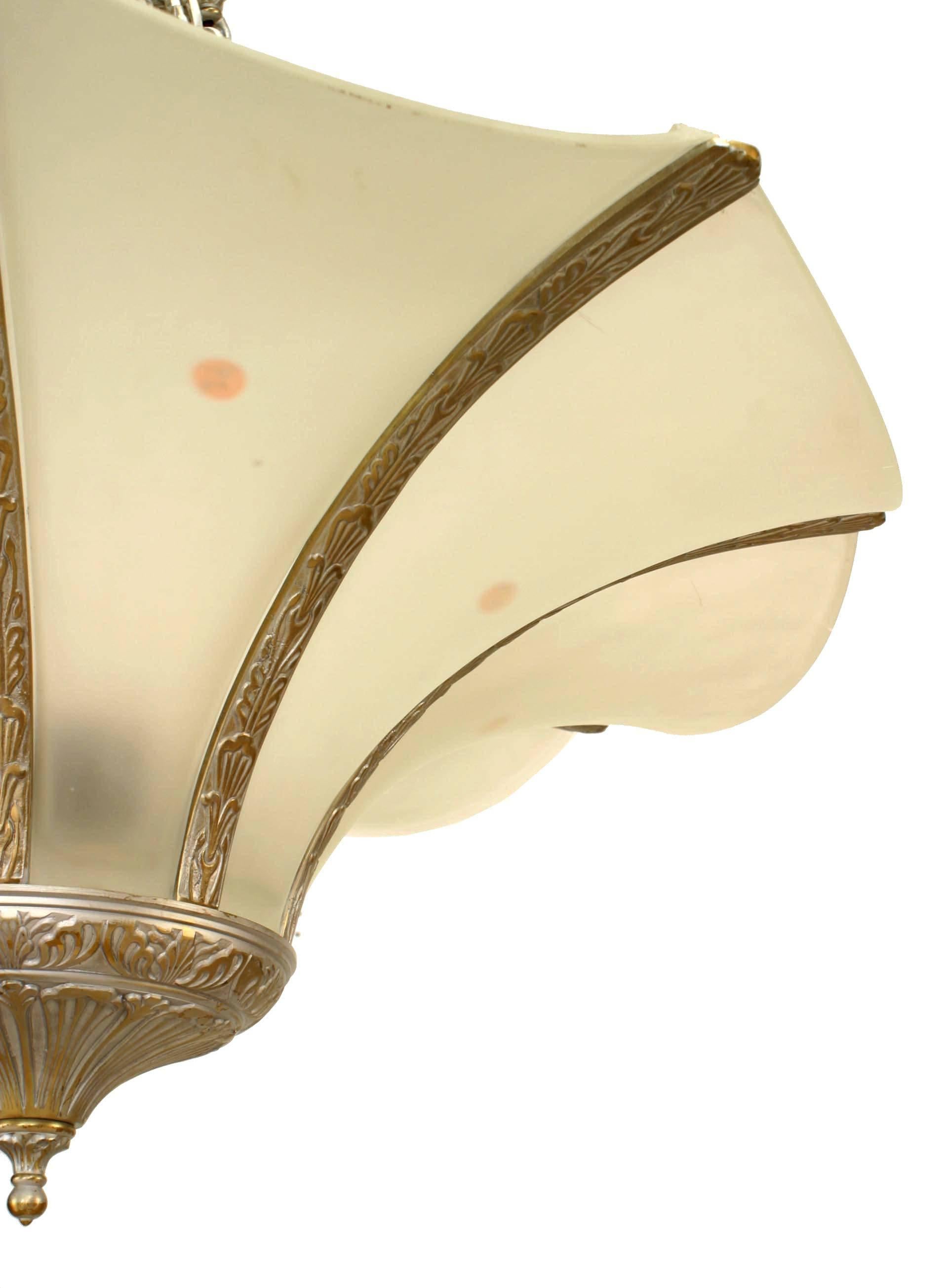 French Art Deco silver painted metal chandeliers with 8 flared frosted glass panel shades.
