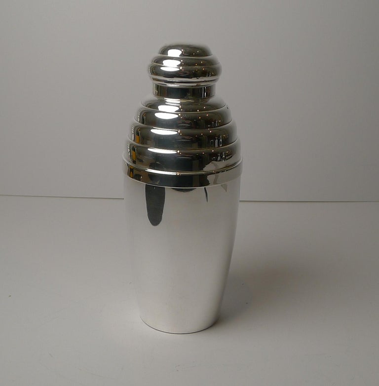 A superb vintage Art Deco cocktail shaker dating to circa 1930, a great looking piece and wonderful shape.

The underside is where the maker's mark can be found for L'Orfèvrerie Brille of Paris under the trade name 