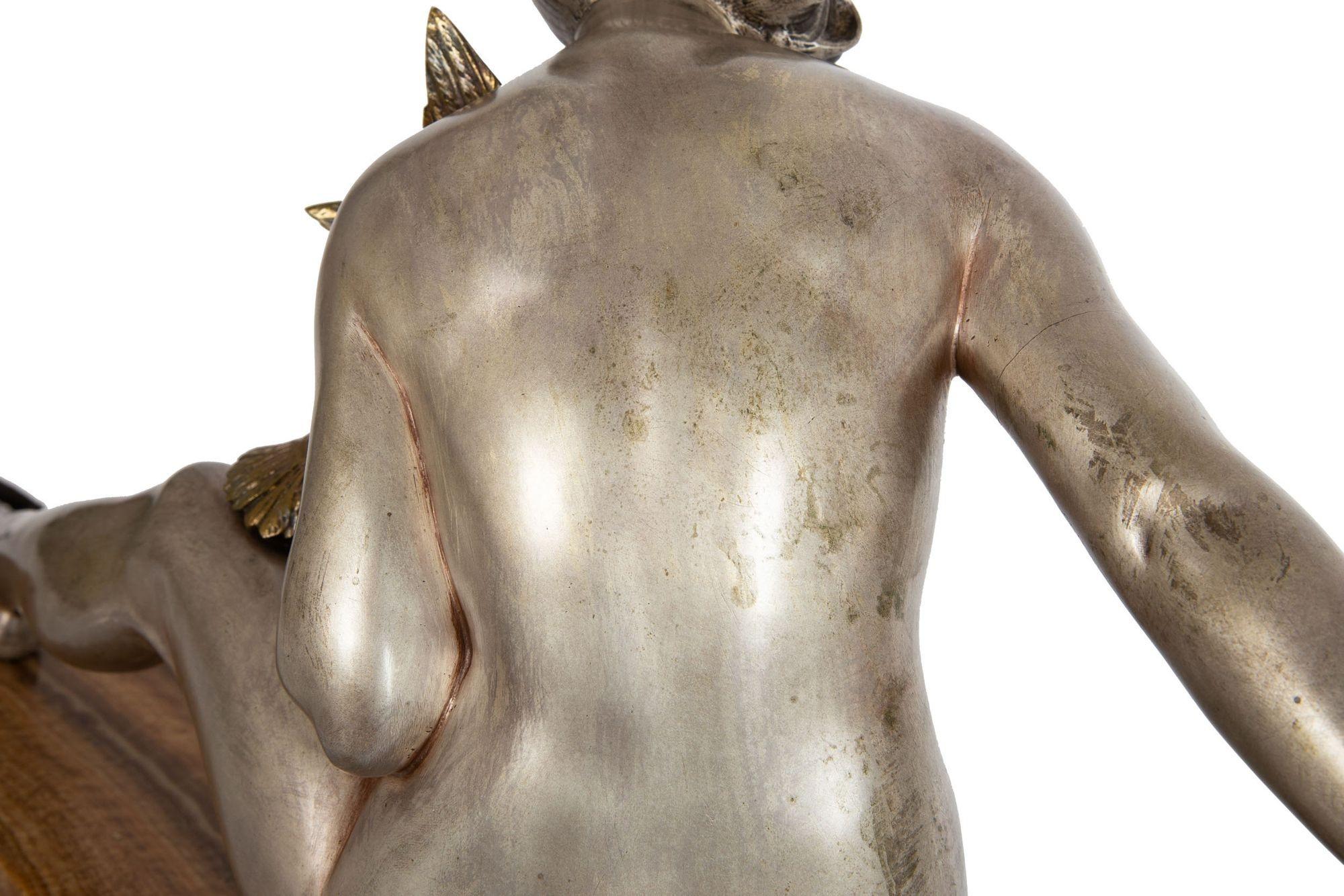 Sculpture française Art déco en bronze argenté représentant une femme avec un oiseau par Armand Godard en vente 4