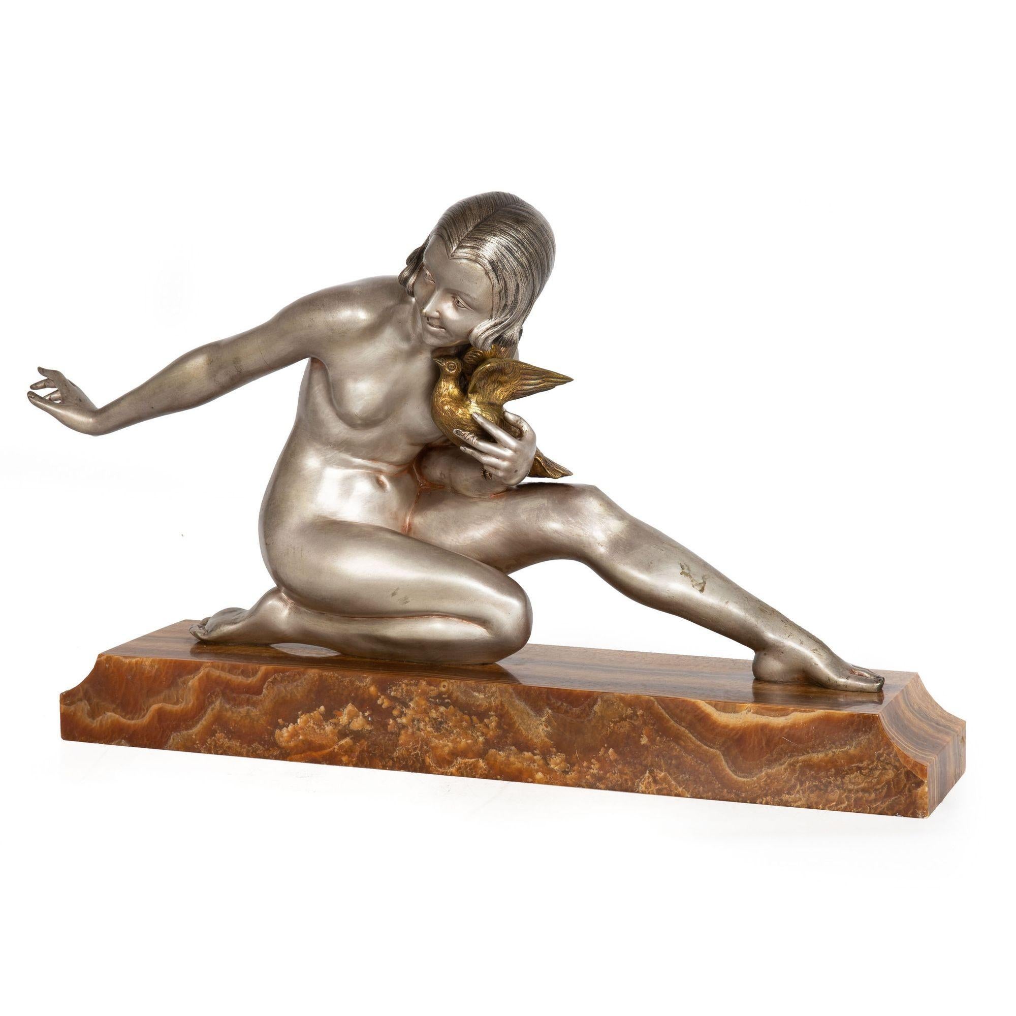ARMAND GODARD
French, fl. 1920s

Seated Woman Holding a Bird

Silver patinated bronze situated over prehistoric petrified wood base  engraved on the base GODARD

Item # 303XAF30W 

An exquisitely cast example of Armand Godard's Seated Woman Holding