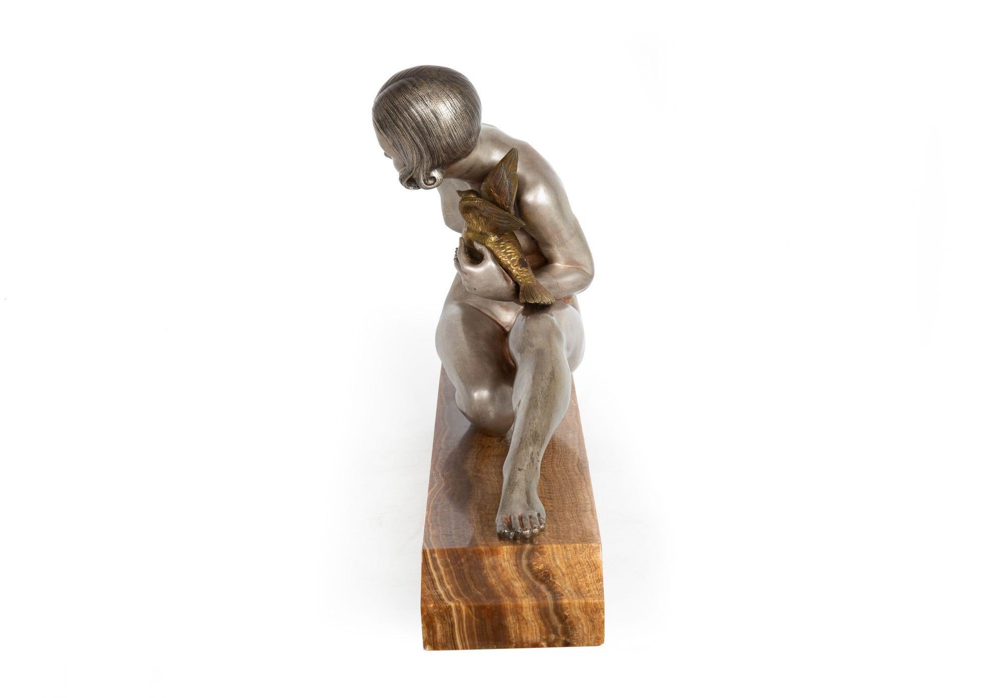 Patinated French Art Deco Silvered Bronze Sculpture “Woman w/ Bird” by Armand Godard For Sale