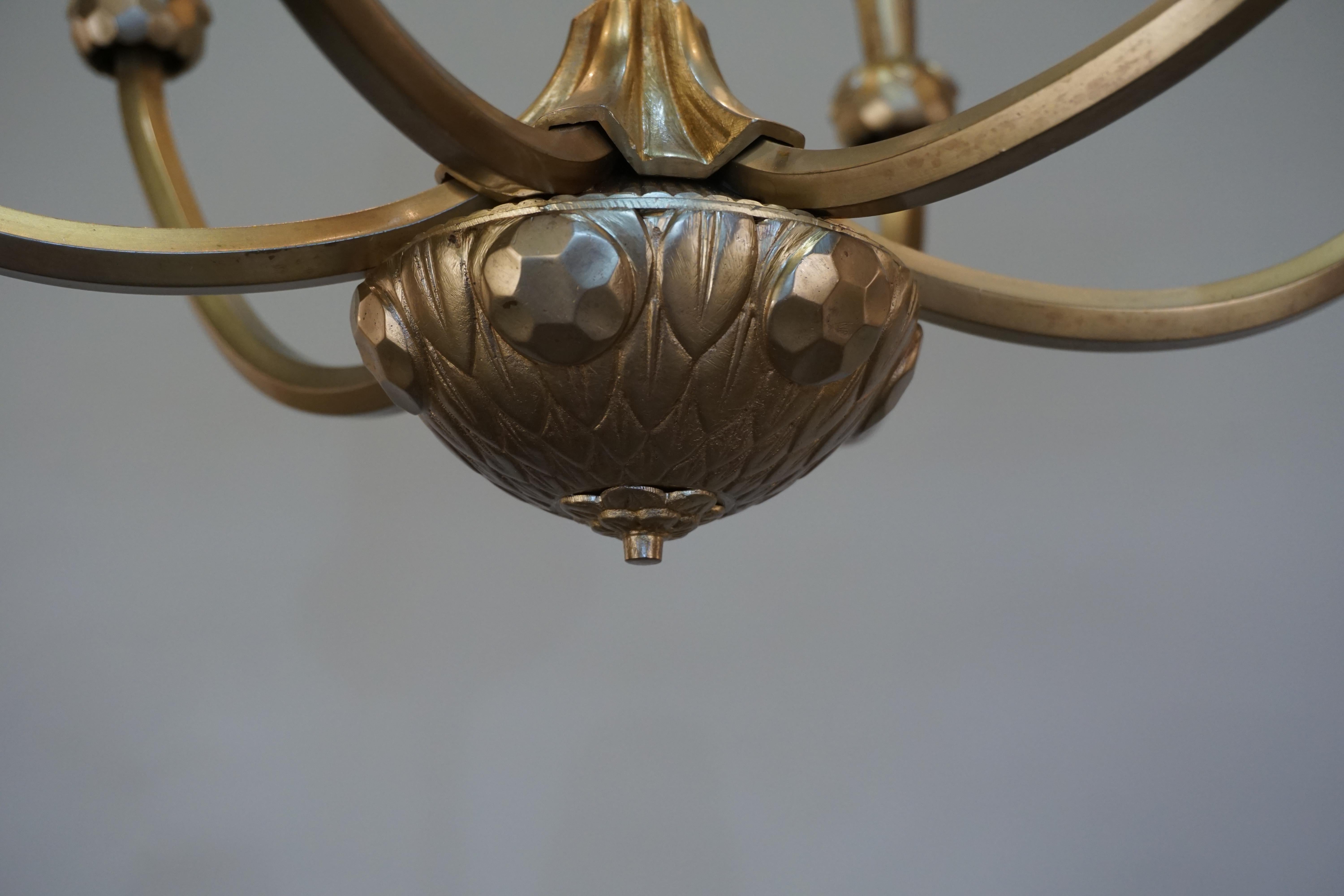 Simple but elegant six-arm, French, 1920s bronze chandelier with silk lampshades.