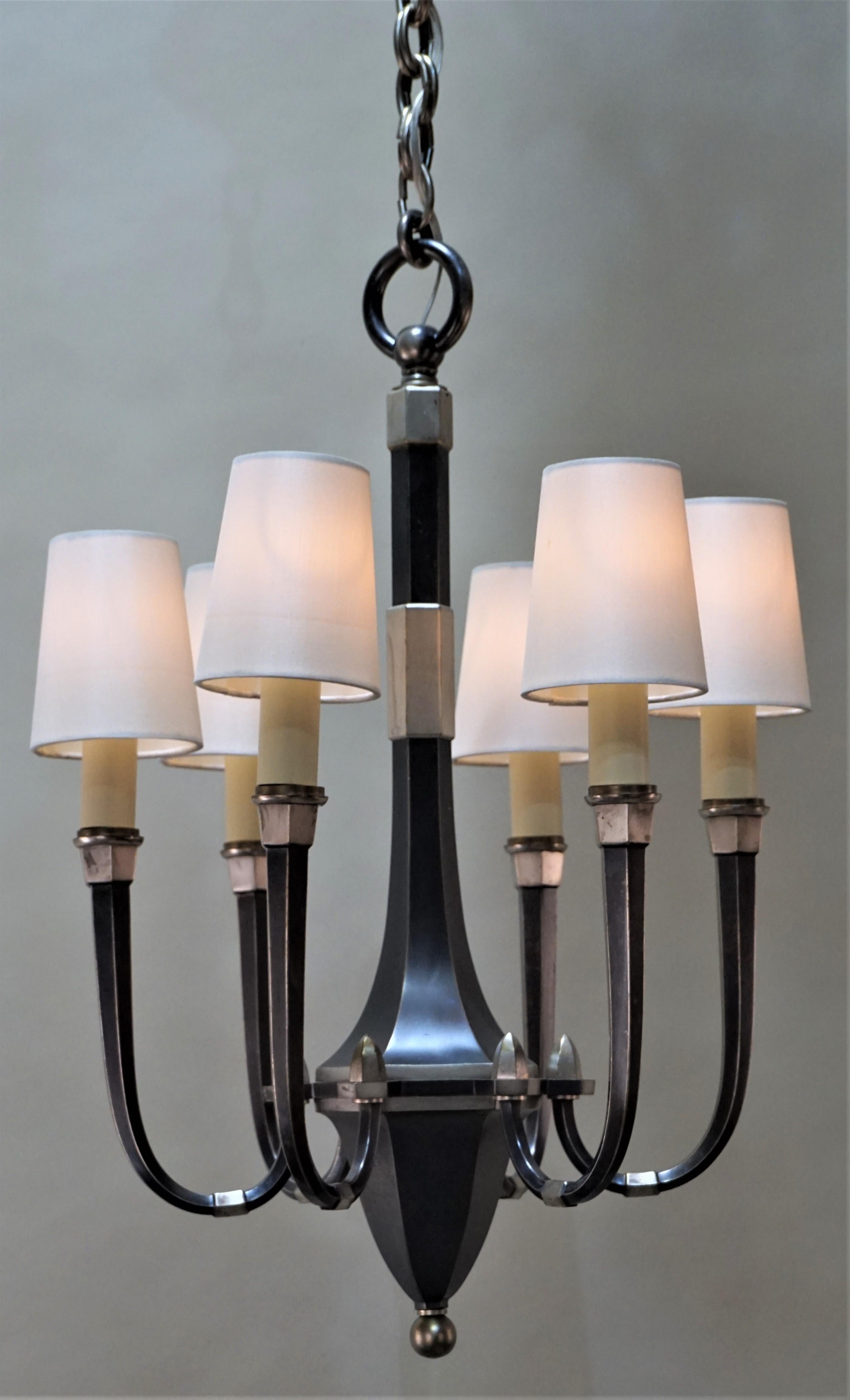 Simple but elegant two-tone silver on bronze Art Deco chandelier.
The minimum height fully installed with 1 link of chain is 32