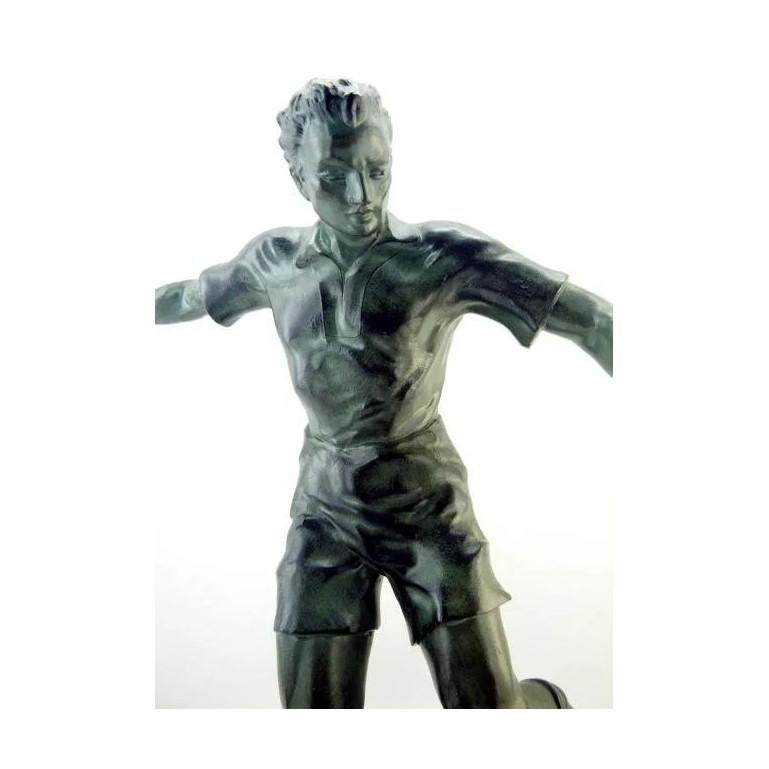 Soccer or football player, 1930. French Art Deco sculpture. Cast metal and marble. Original green bronze patina. Marble base. Dedicated from 