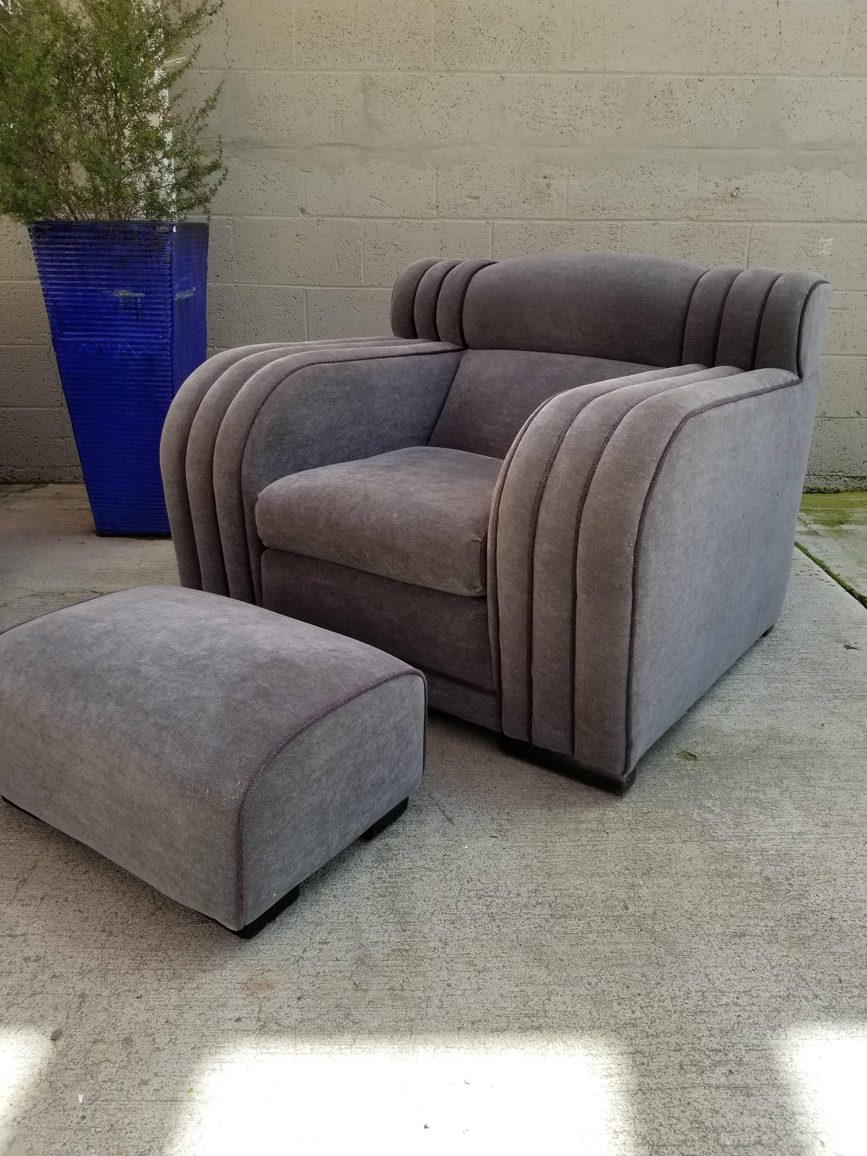 Exquisite four-piece set consisting of a sofa, lounge chair and two footstools. A fine example of the French Art Deco period, circa 1920s. Upholstered in mohair. Club chair measures 39.75