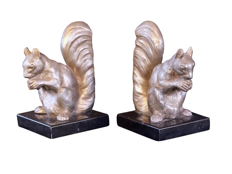 Patinated French Art Deco Squirrel Bookends For Sale