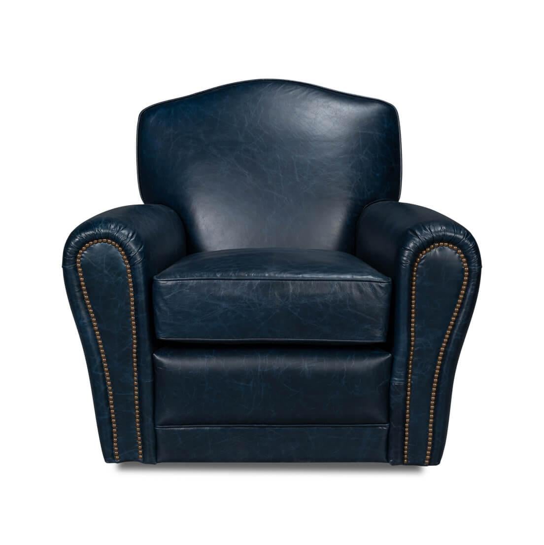 Art Deco style leather upholstered club chair, in Chateau Blue leather, with long rolled arms, a padded seat back, and cushions, with detailed nailhead trim and raised on a swivel base.
Dimensions: 36