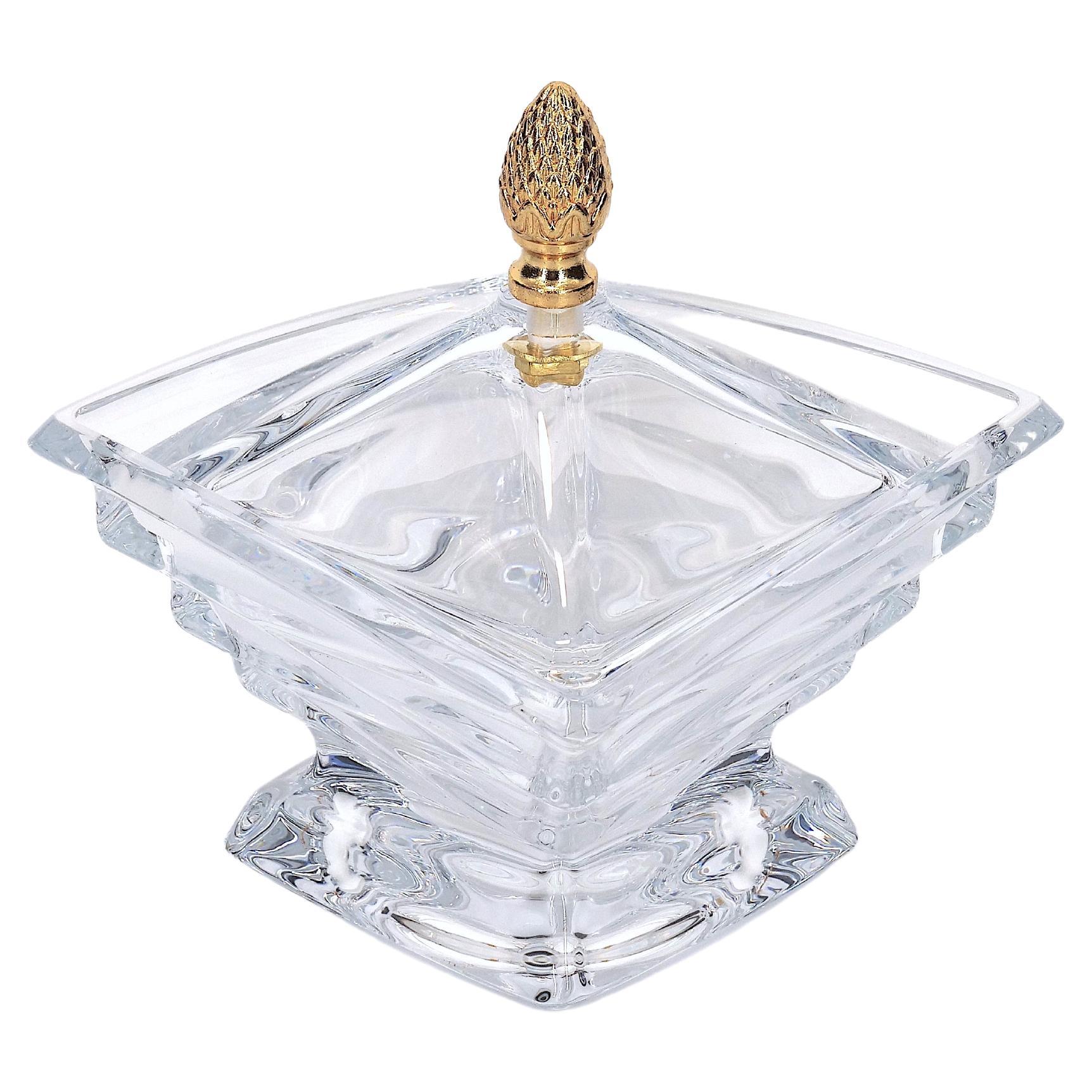 Late 20th century French cut crystal art deco style tableware covered serving piece. The piece features a geometric art deco style shape and a gilt top brass pinecone finial covers resting on a squared base. The piece is in great condition. Maker's