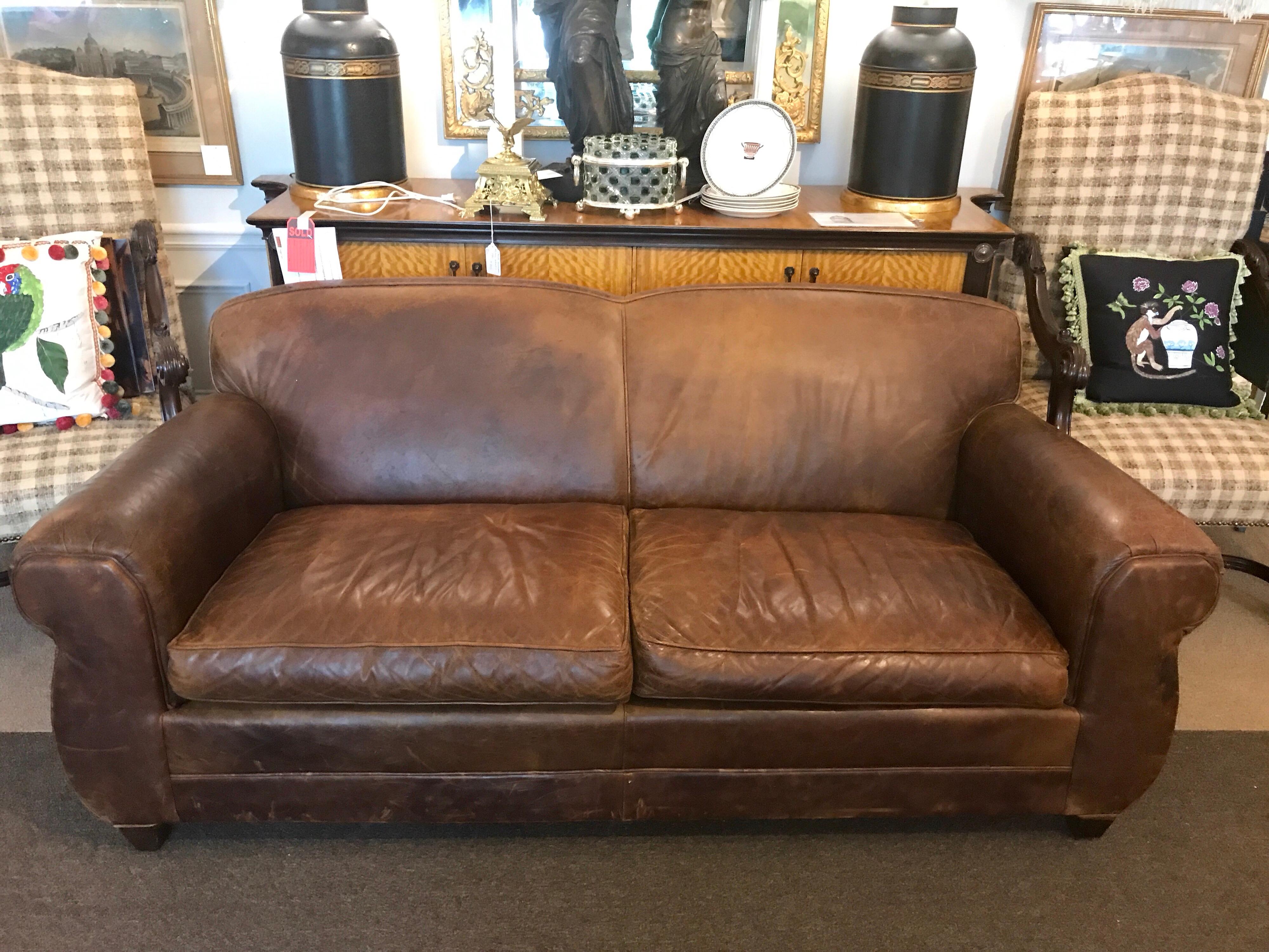 French Art Deco style distressed leather sofa, gorgeous sofa with great distressed patina structurally sound, with two removable 22