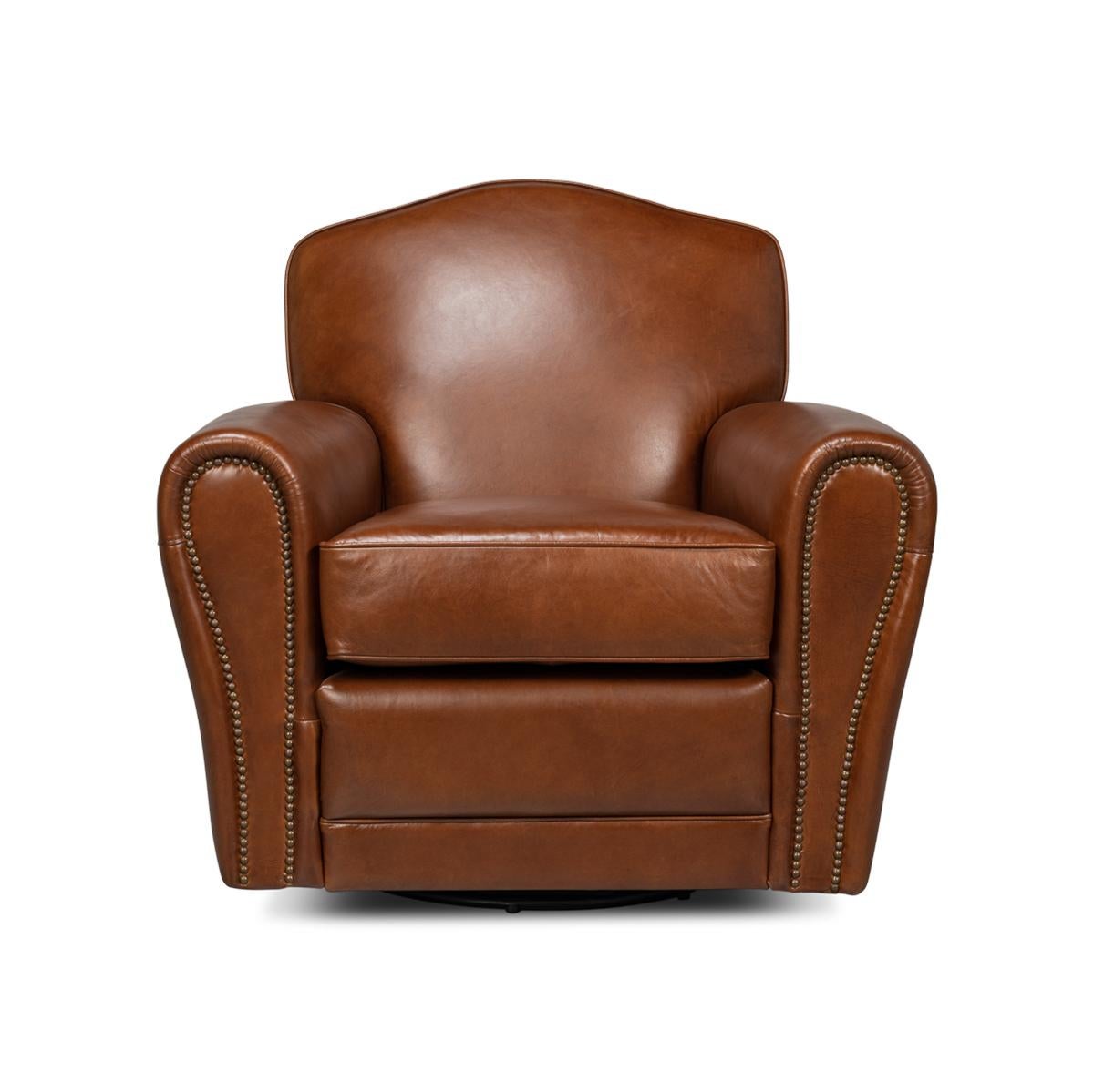 An Art Deco style leather upholstered club chair, in our Havana brown color leather, with long rolled arms, a padded seat back, and cushions, with detailed nailhead trim and raised on a swivel base.

Dimensions: 36