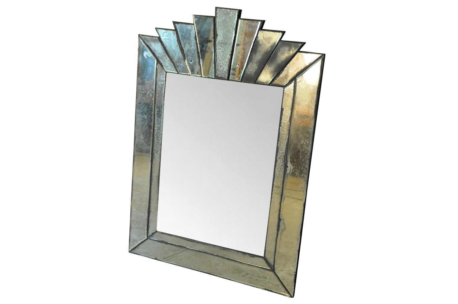 A very charming and elegant French Art Deco style mirror. Wonderful character with beautiful crazing. Please note that the central part of the mirror has been photo shopped.
