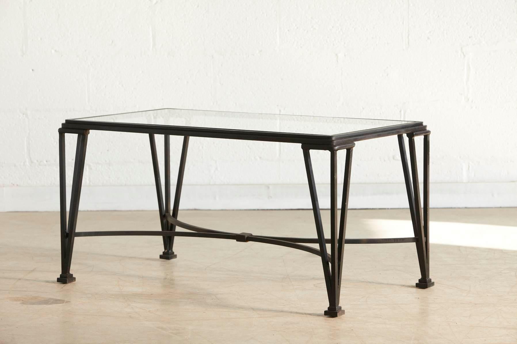 black wrought iron coffee table with glass top